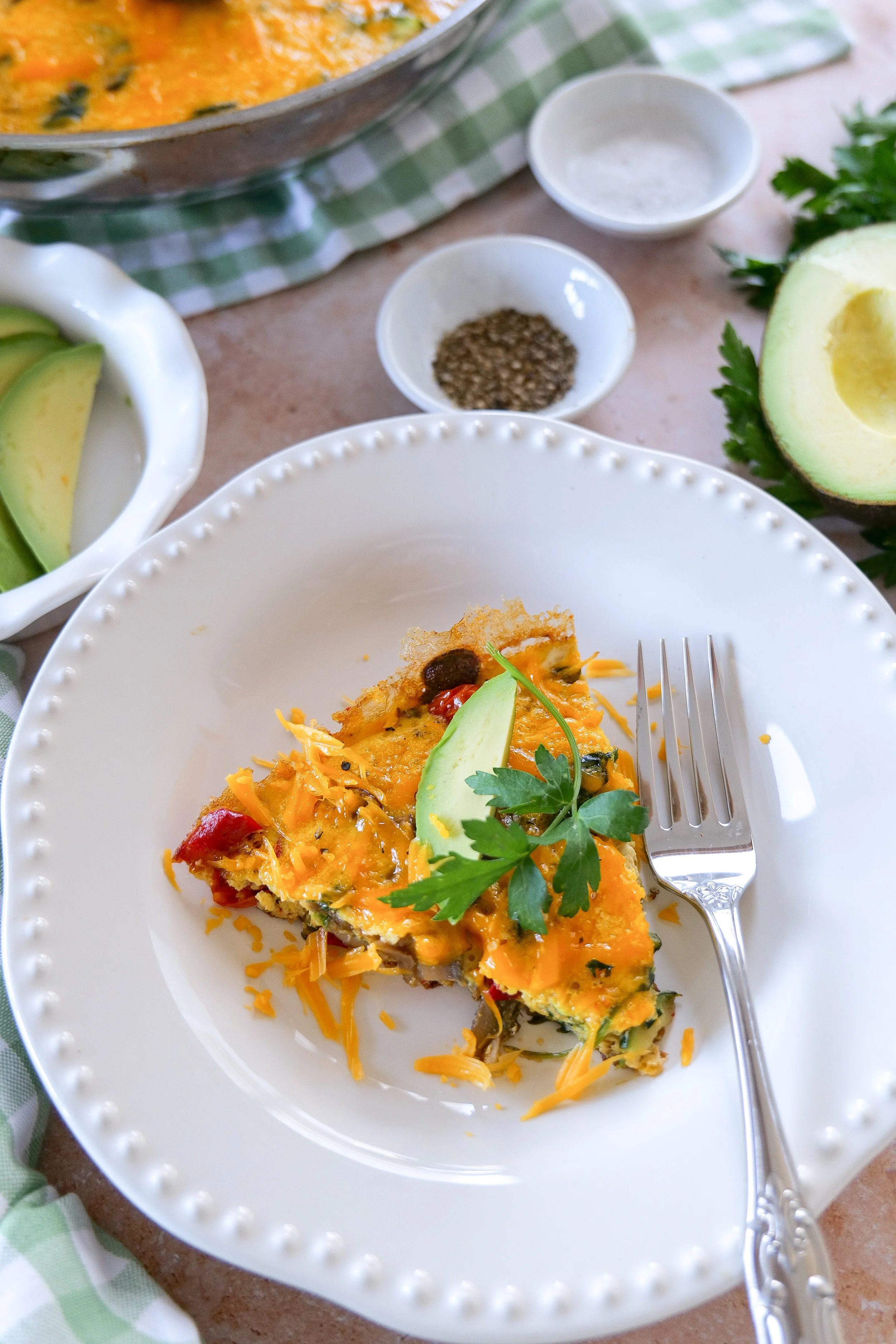 Baked vegetable frittata with fresh summer ingredients and cheese