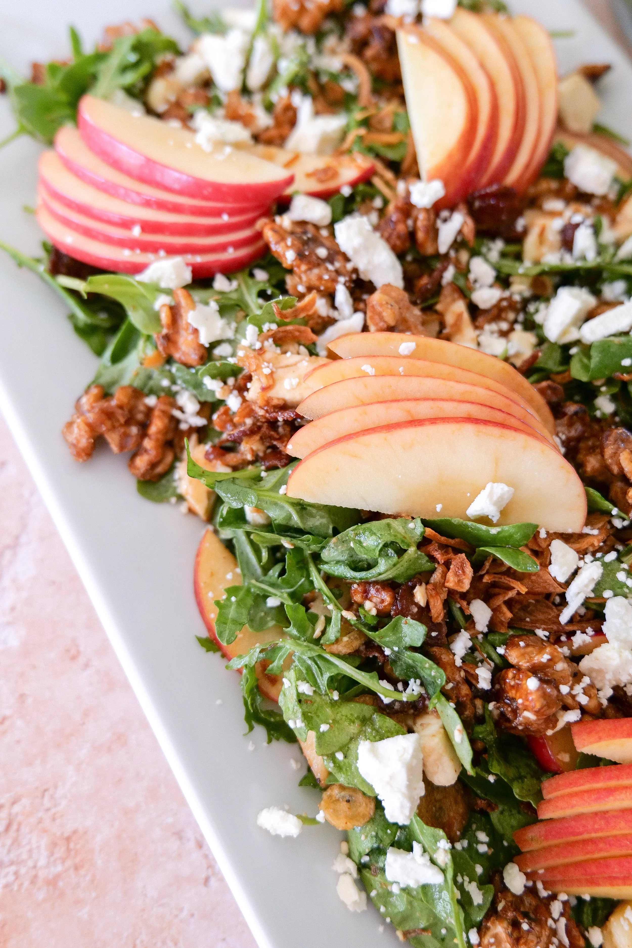 Autumn apple salad with feta, smoky bacon, maple walnuts and mixed greens.