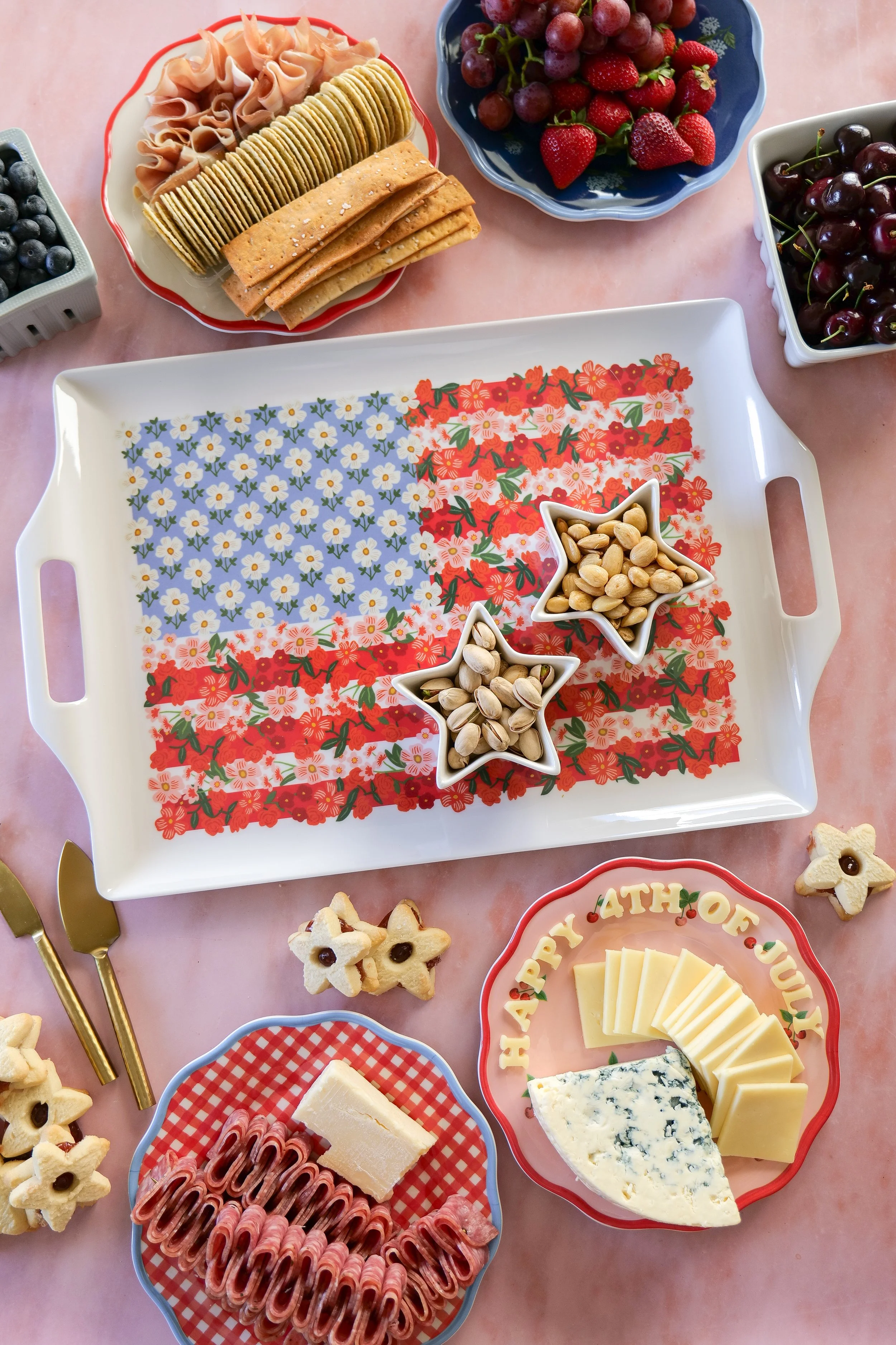 Red, white, and blue charcuterie board styled for a Fourth of July party.