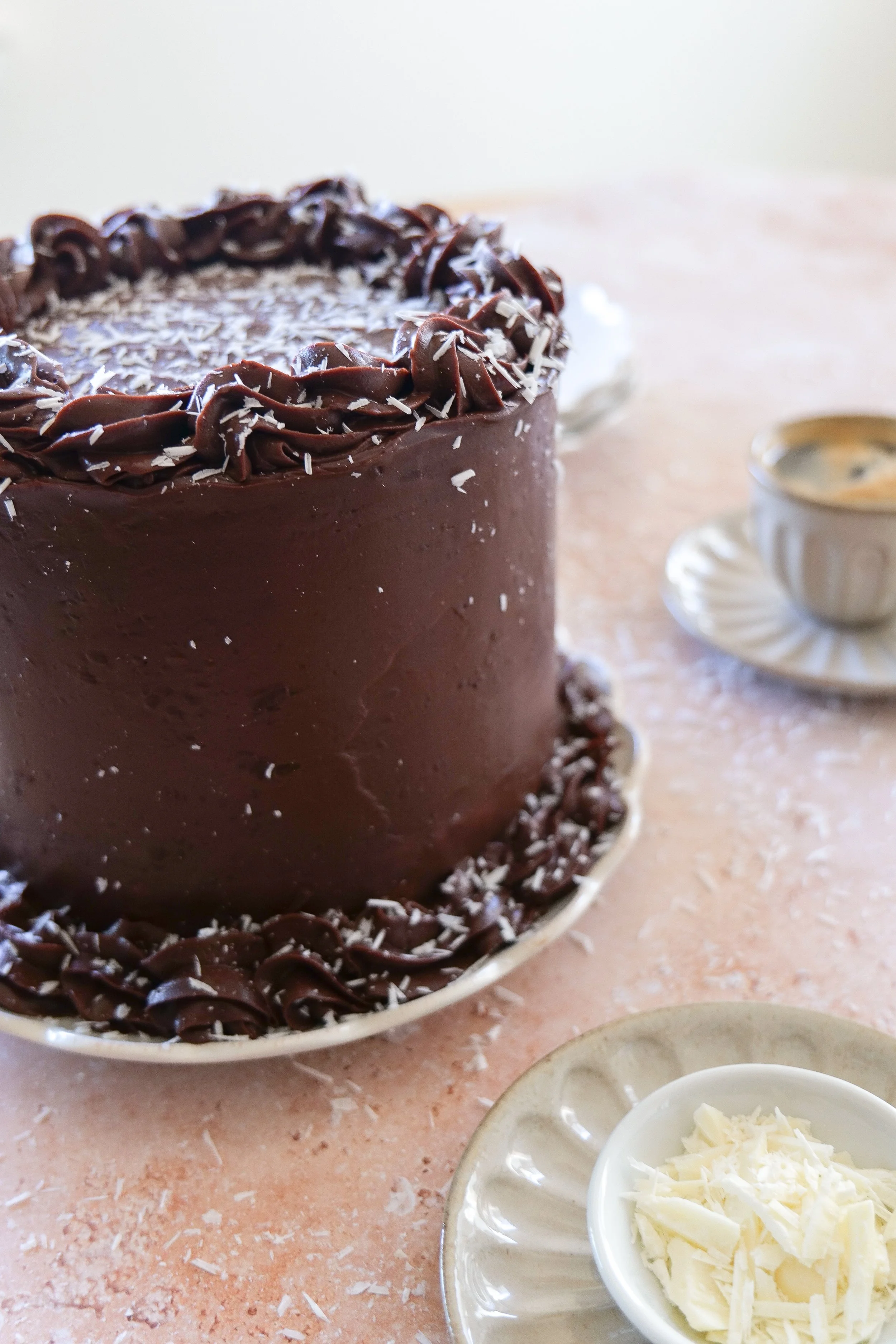 Rich chocolate cake layered with dark chocolate mousse for a homemade Tuxedo Cake.