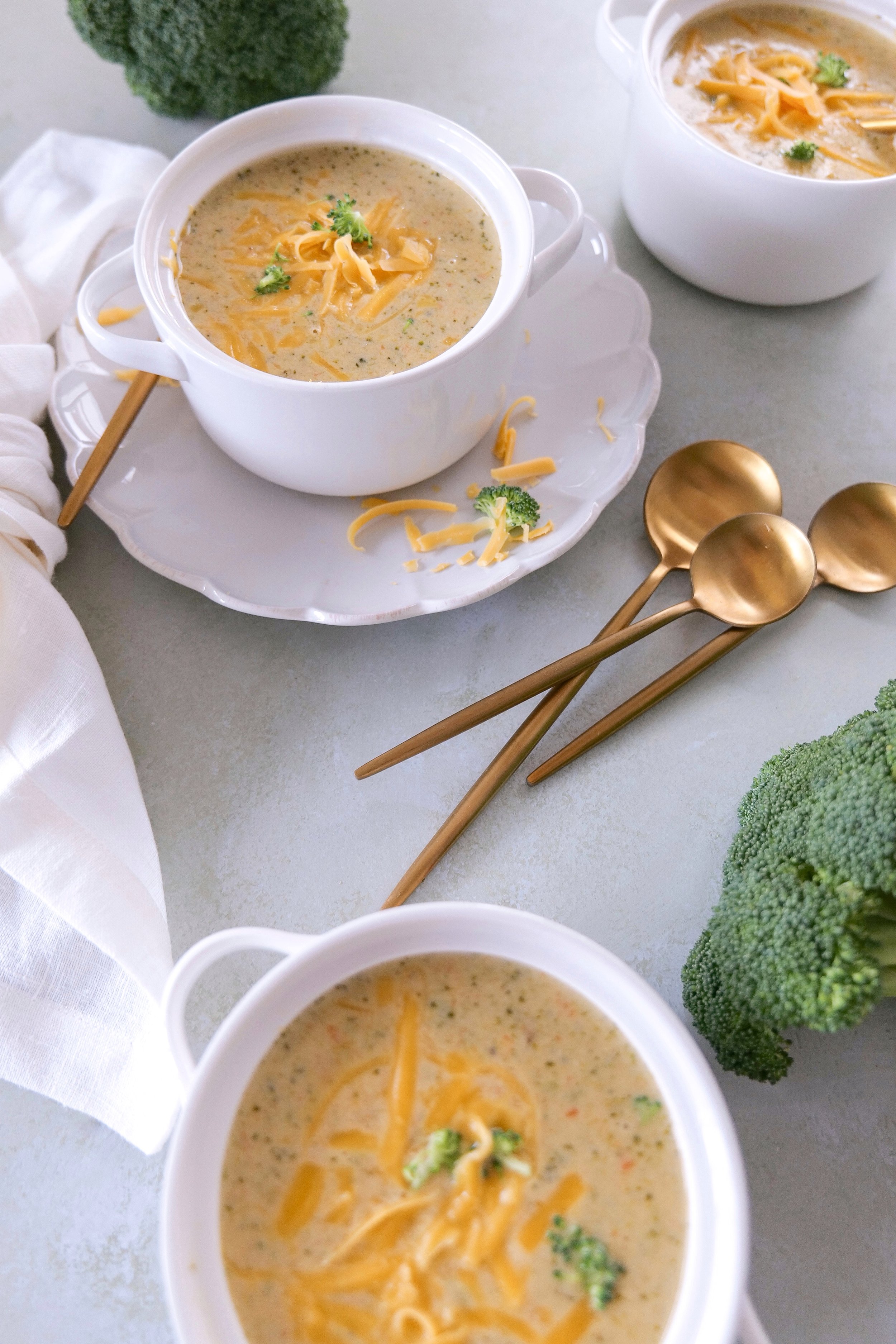 Easy homemade broccoli cheese soup with a creamy cheddar broth.
