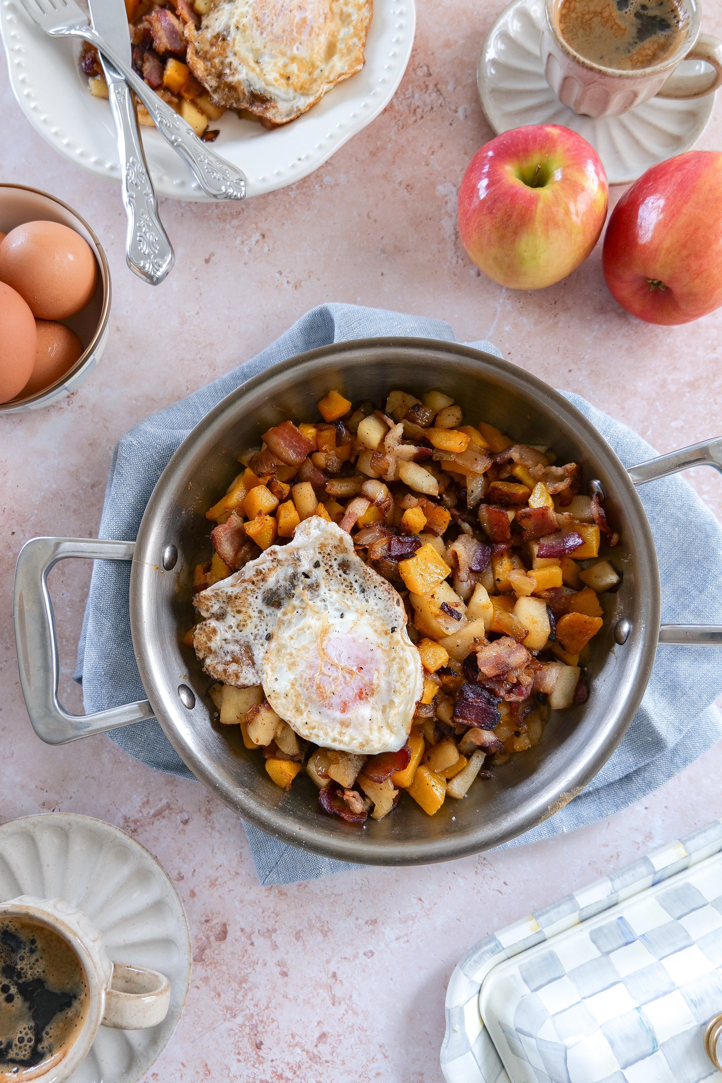 Butternut squash hash served with fried eggs for an easy fall brunch.
