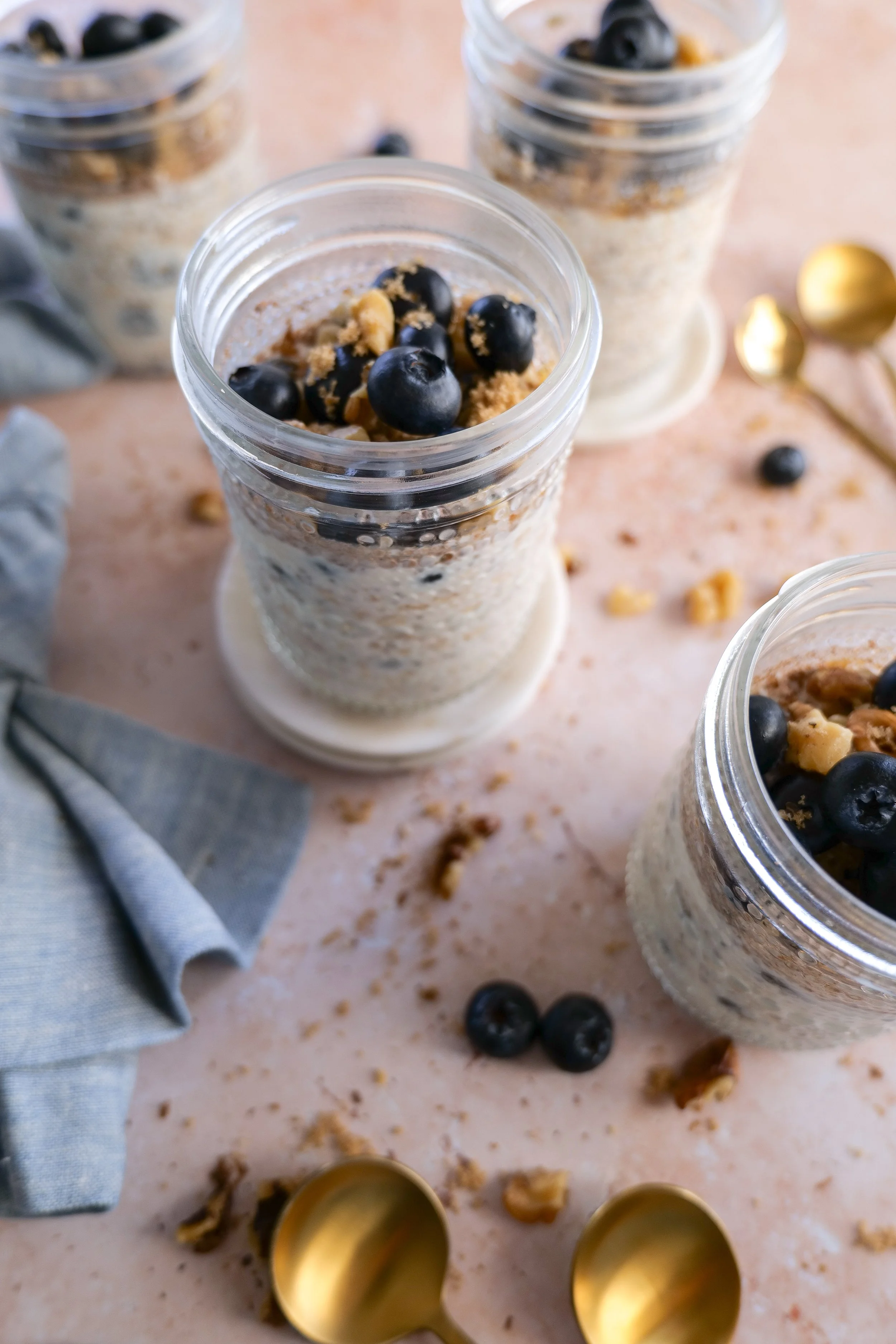 Creamy overnight oats with blueberries and cinnamon served chilled.
