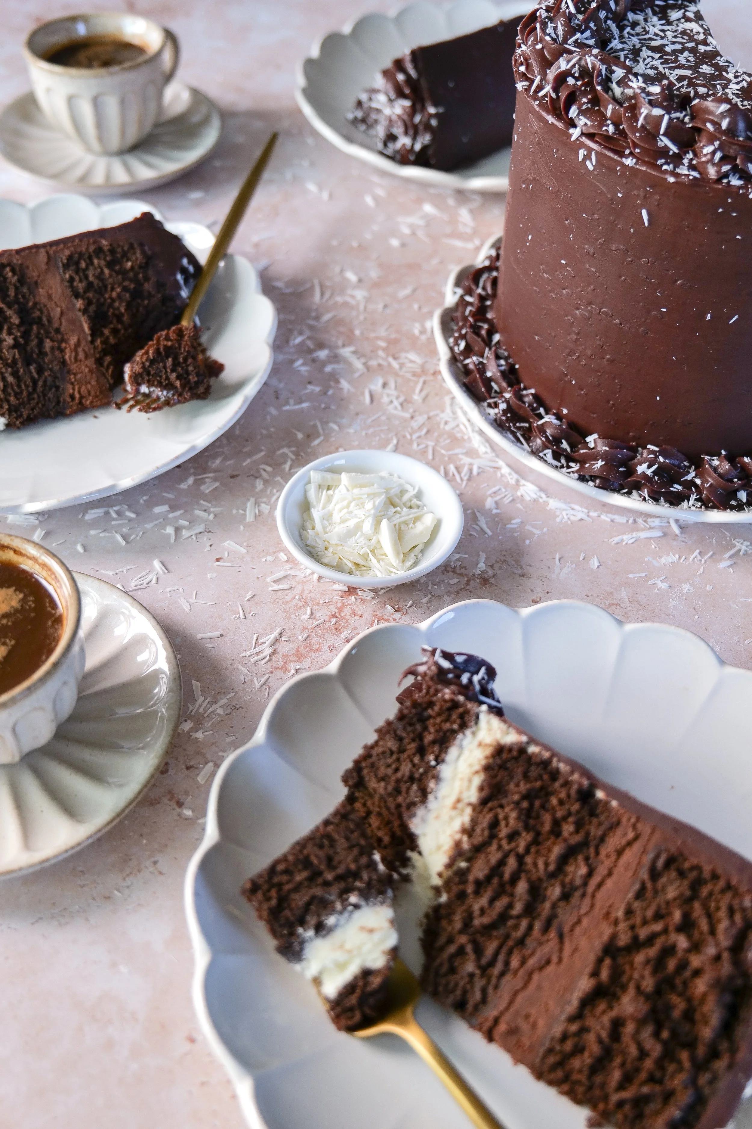 Chocolate Tuxedo Cake finished with a smooth and decadent milk chocolate ganache.