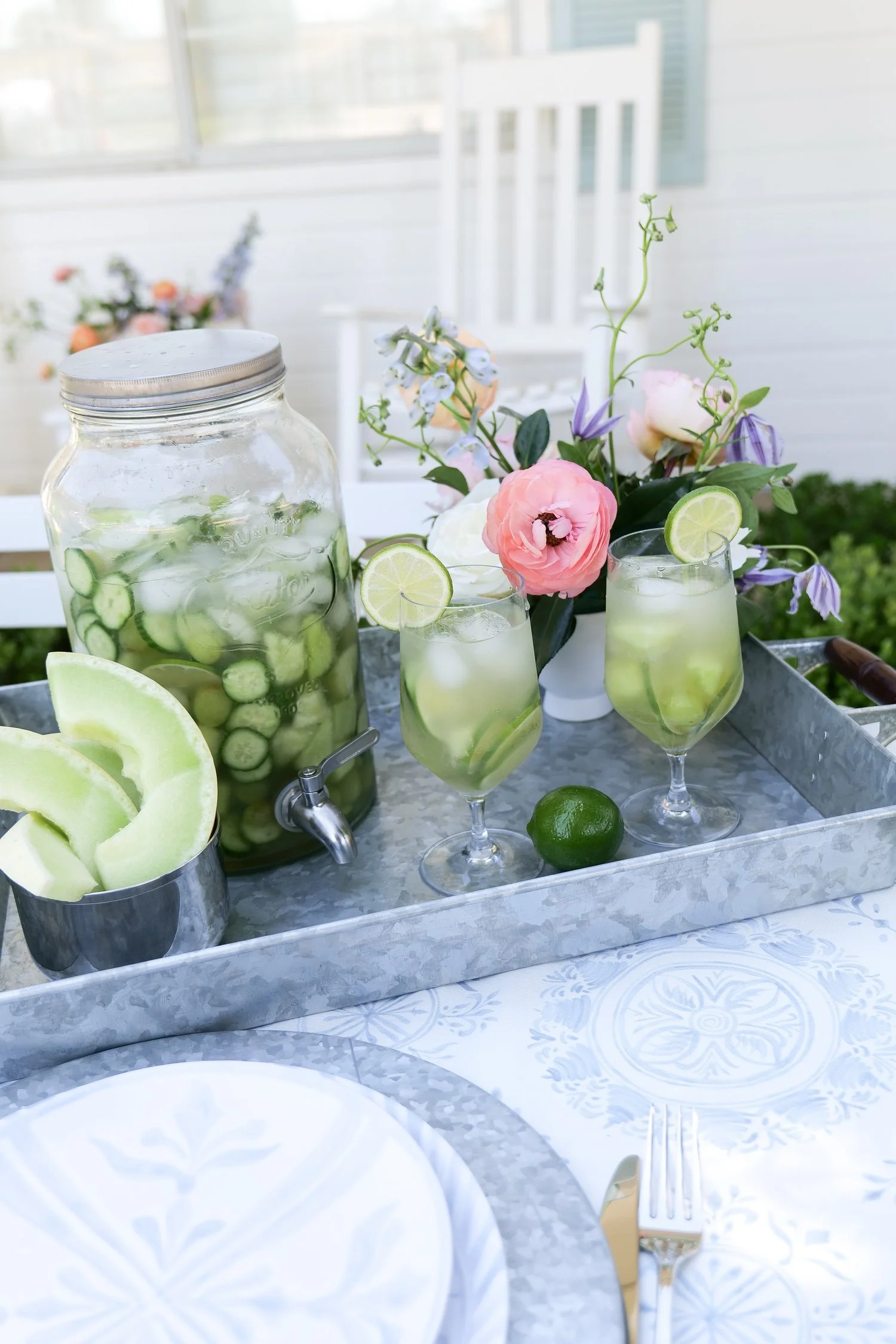 Melon and cucumber sangria pitcher with green grapes
