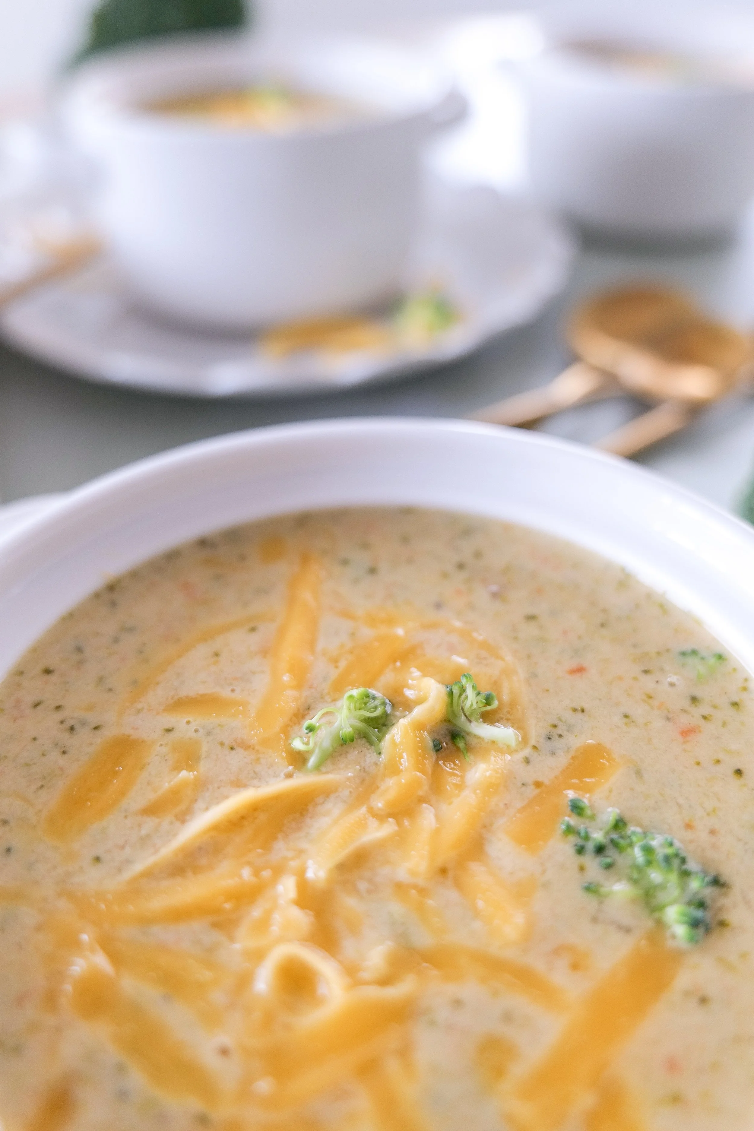 Easy broccoli cheddar soup with a rich and creamy cheddar cheese broth.