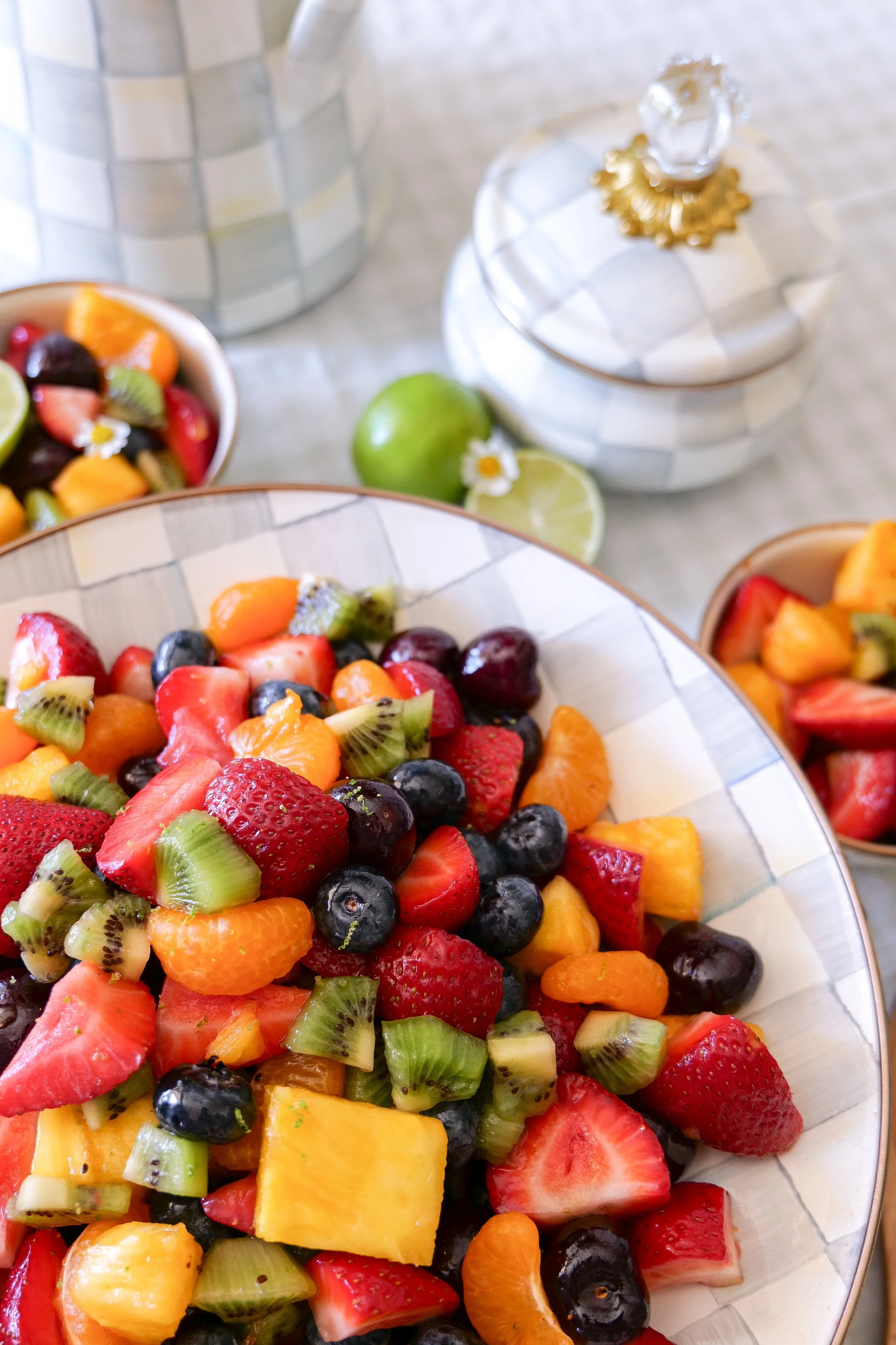 Honey lime fruit salad with fresh berries, pineapple, kiwi and cherries