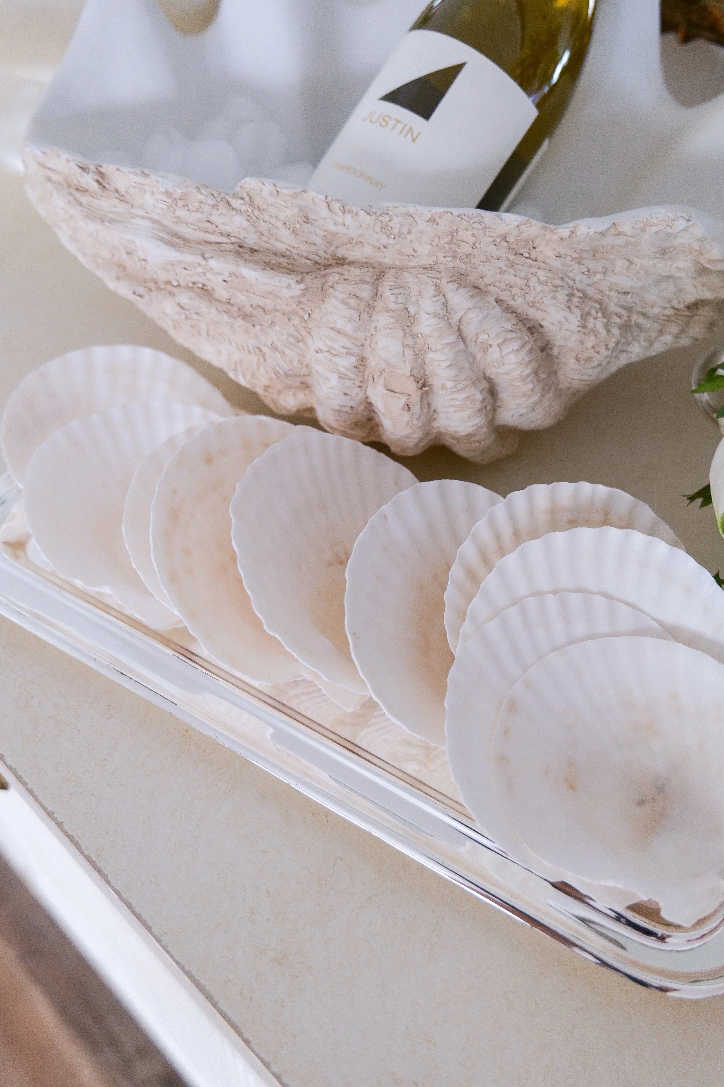 Pearls Shells and Chardonnay themed entertaining setup