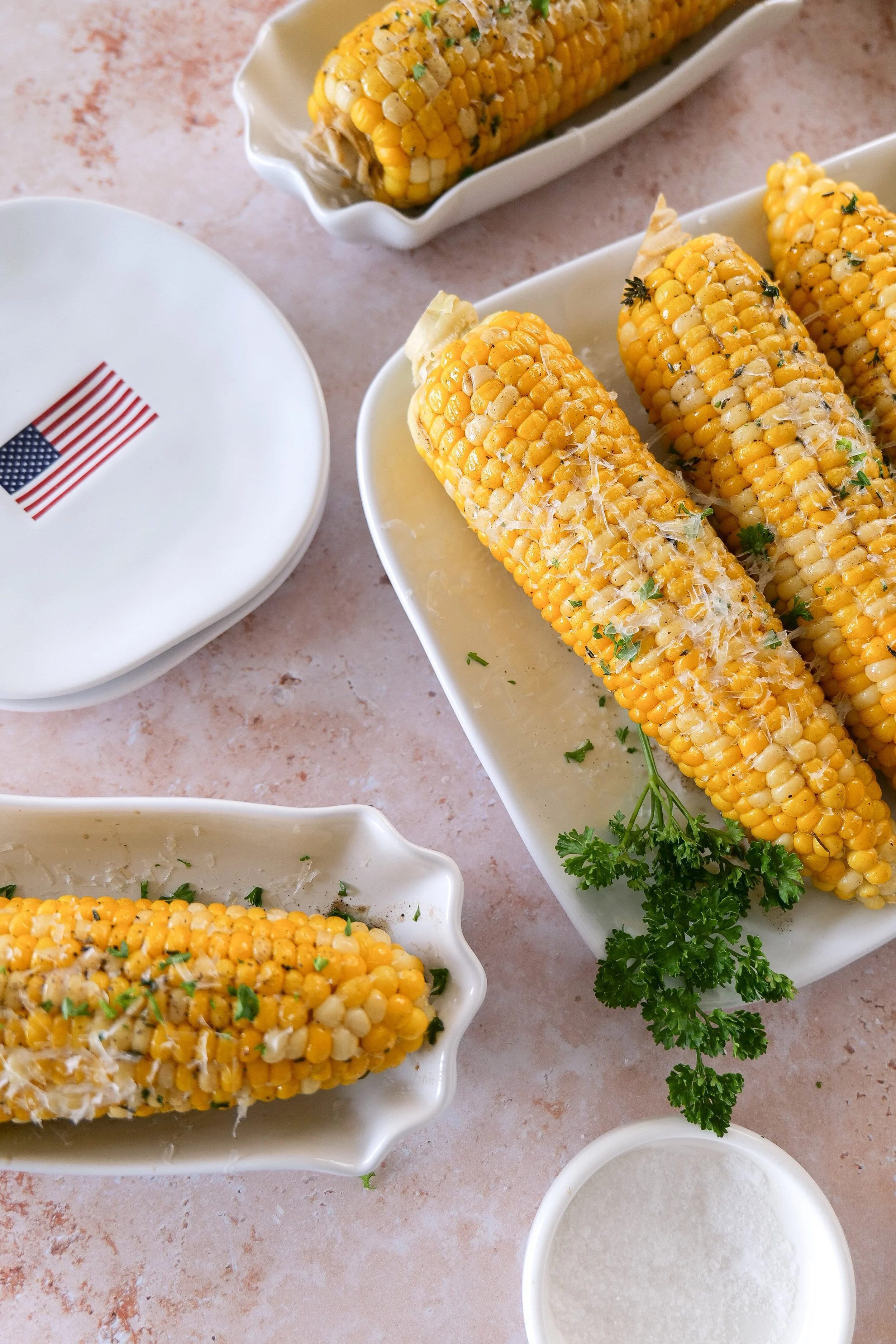 Family-style serving platter filled with corn on the cob