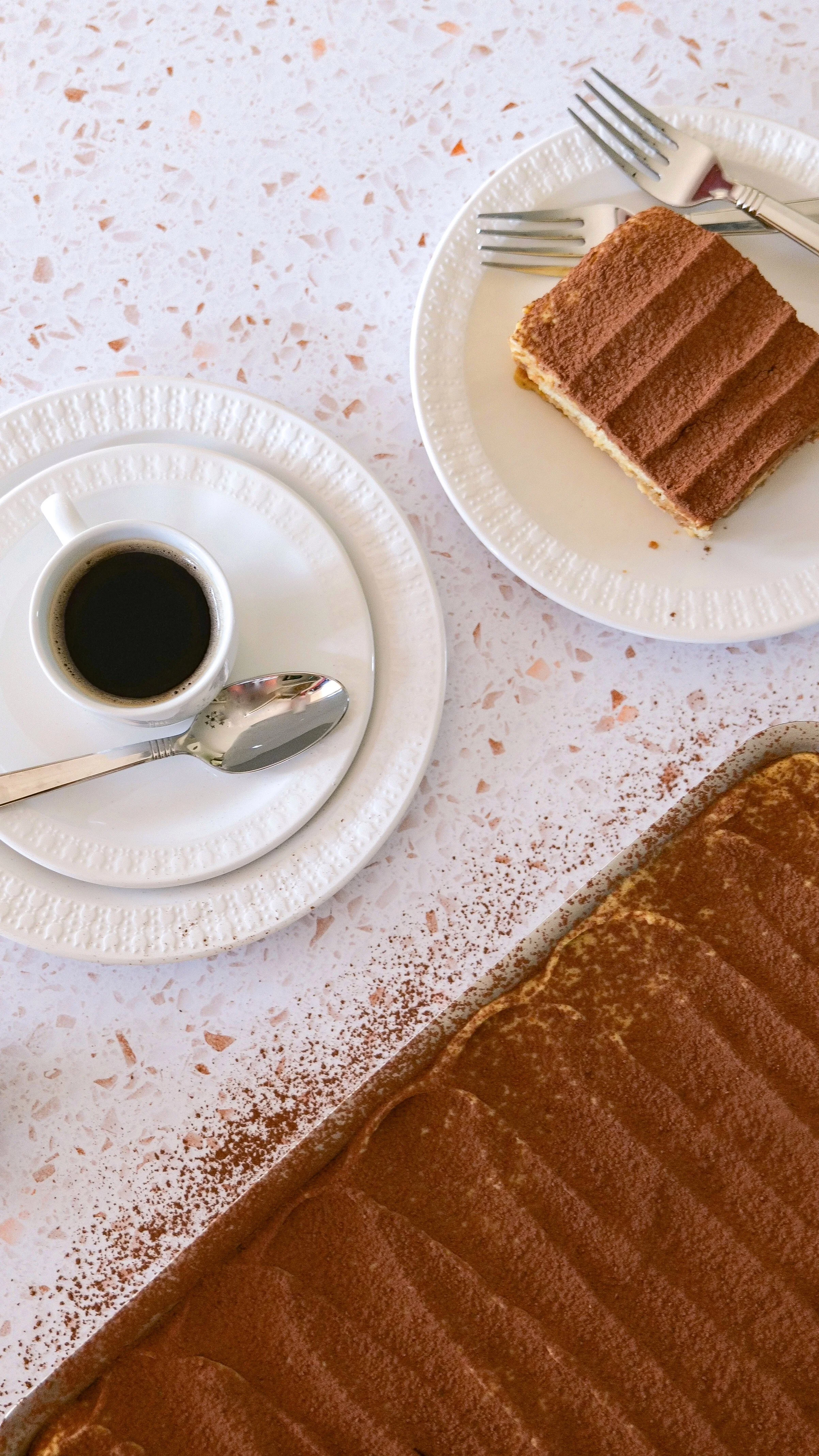 Fall pumpkin tiramisu topped with cocoa powder and pumpkin pie spice.
