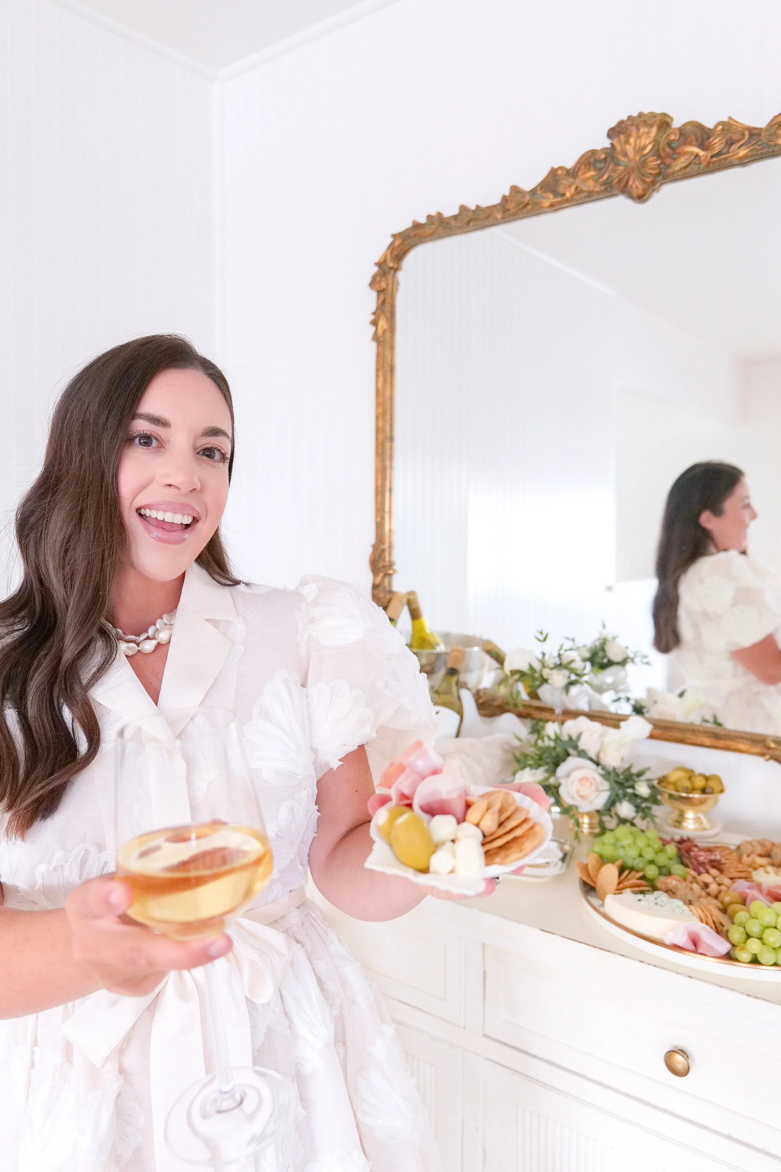 Neutral summer hosting outfit perfect for an elevated coastal tablescape