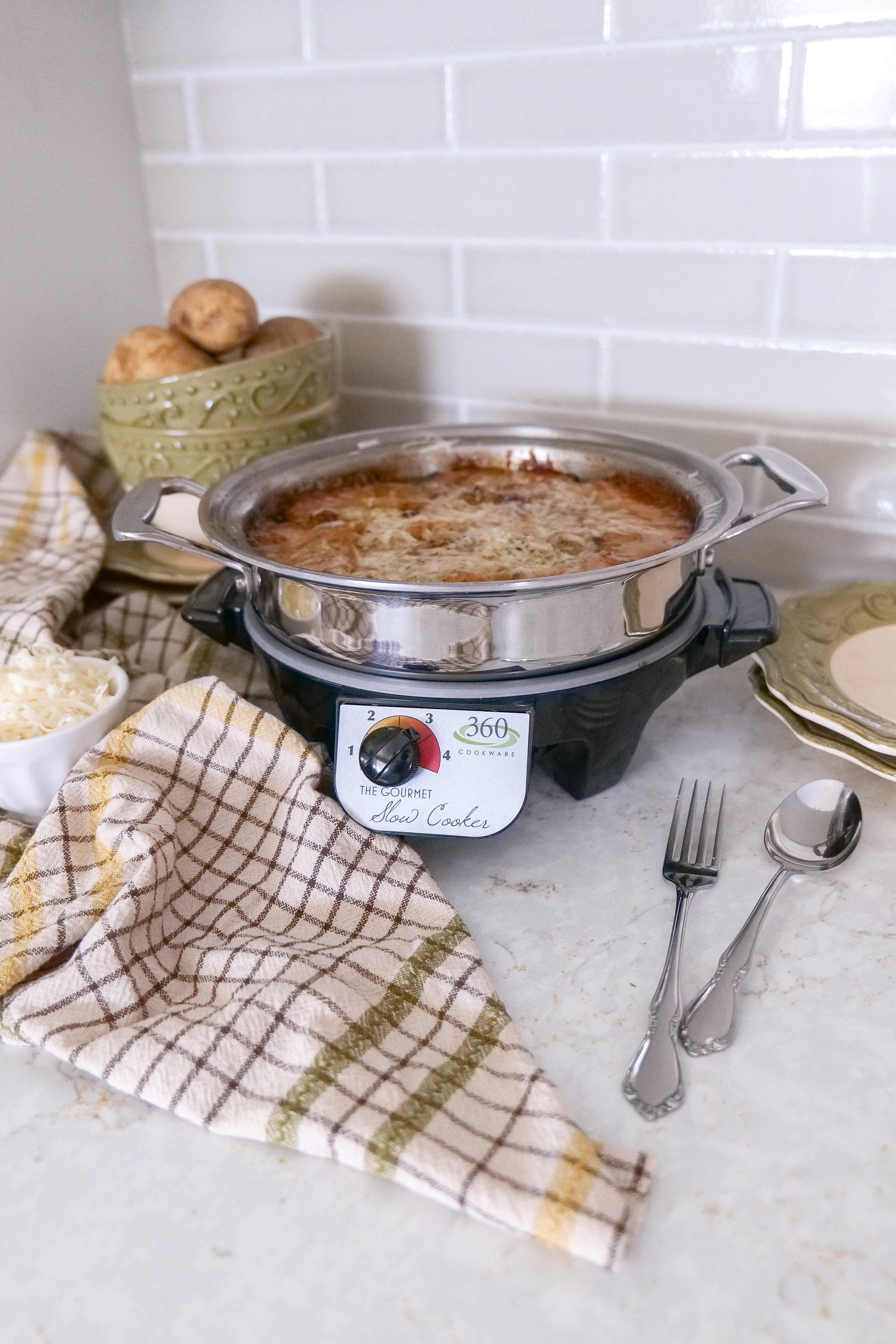 Homemade scalloped potatoes with a creamy herb sauce.