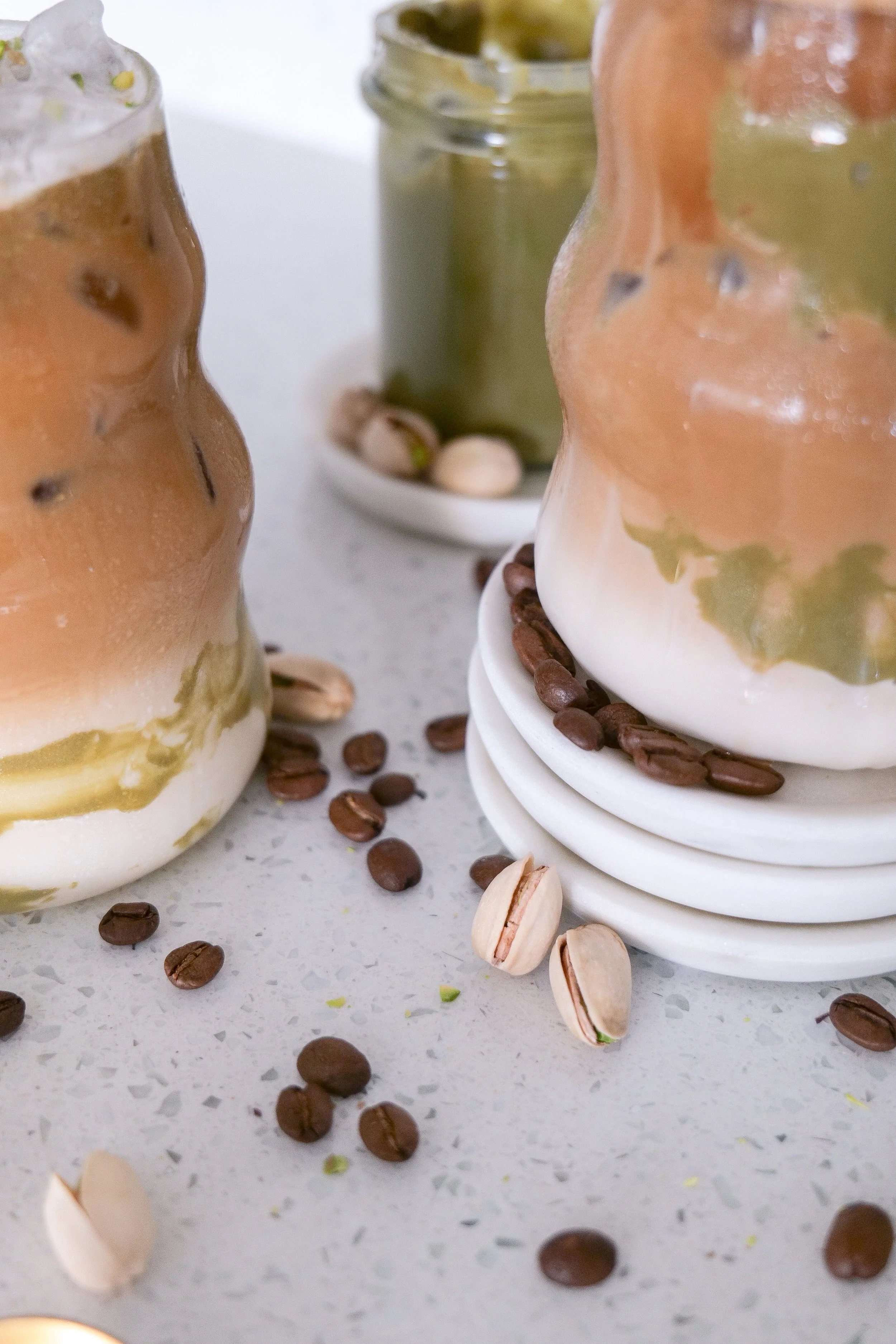 Coffee shop–style iced pistachio latte made at home with espresso and pistachio flavor.