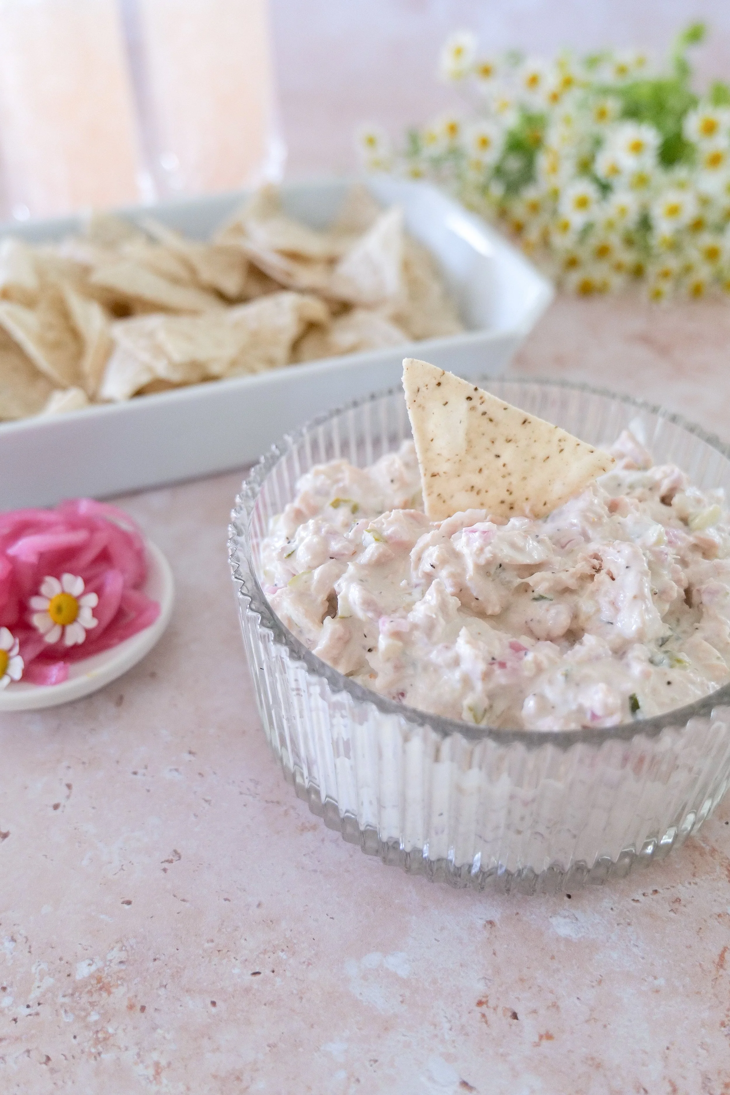 Cream cheese tuna dip with chopped pickles and red onions