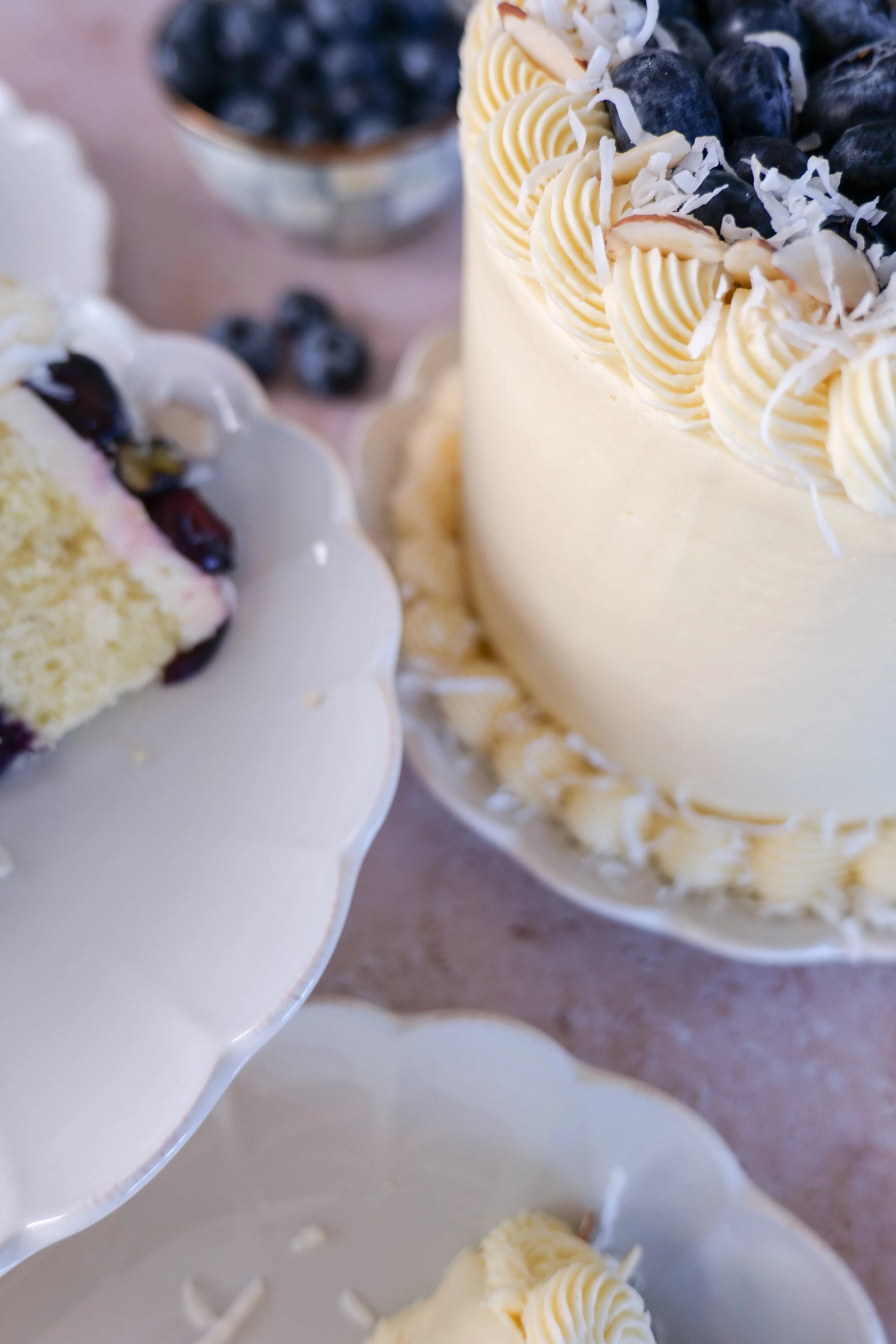 Almond coconut cake served on a spring dessert table for entertaining.
