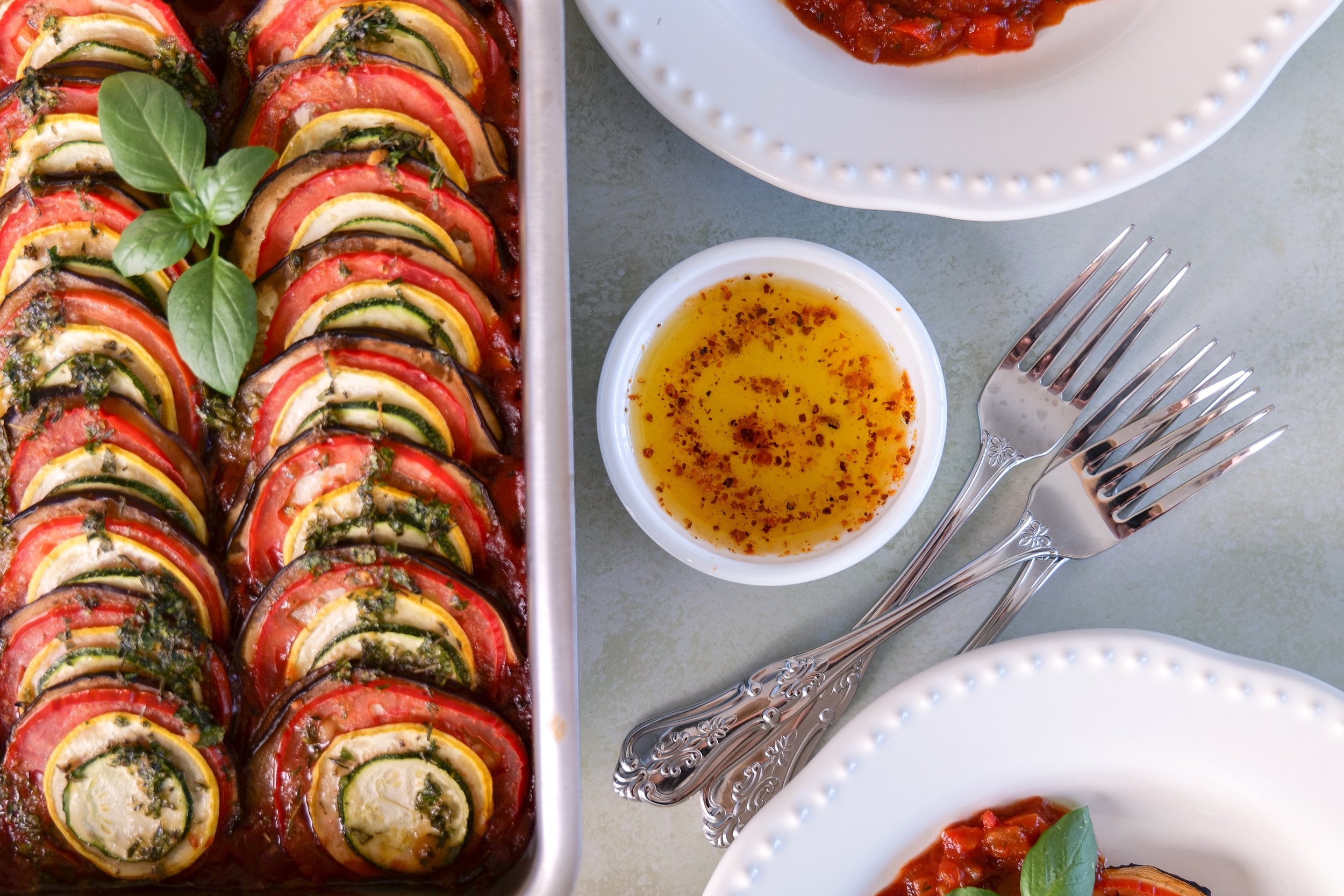 Overhead view of classic French ratatouille served in a rustic skillet.