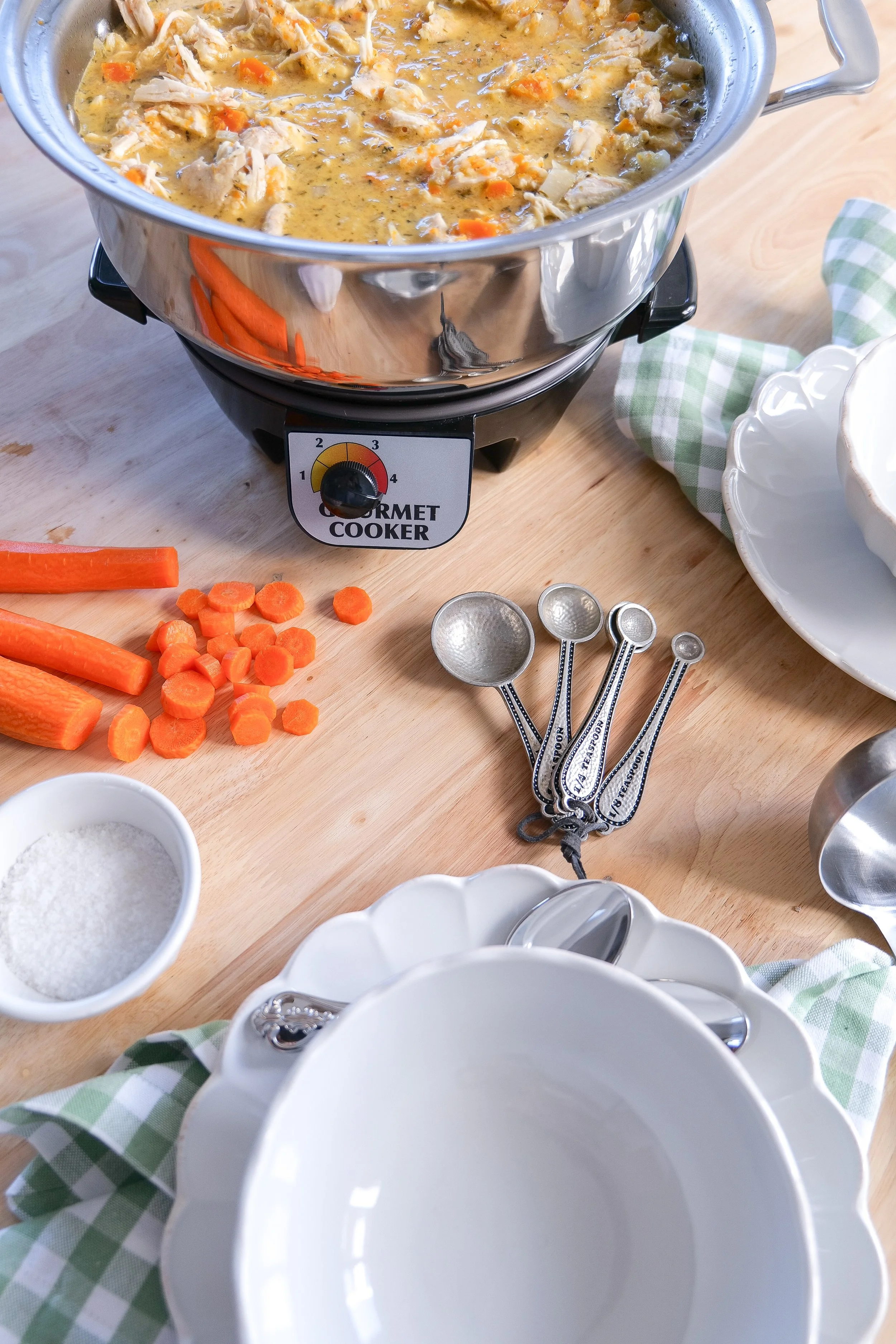 Pastina soup with shredded chicken, carrots and celery served in a flavorful chicken broth.