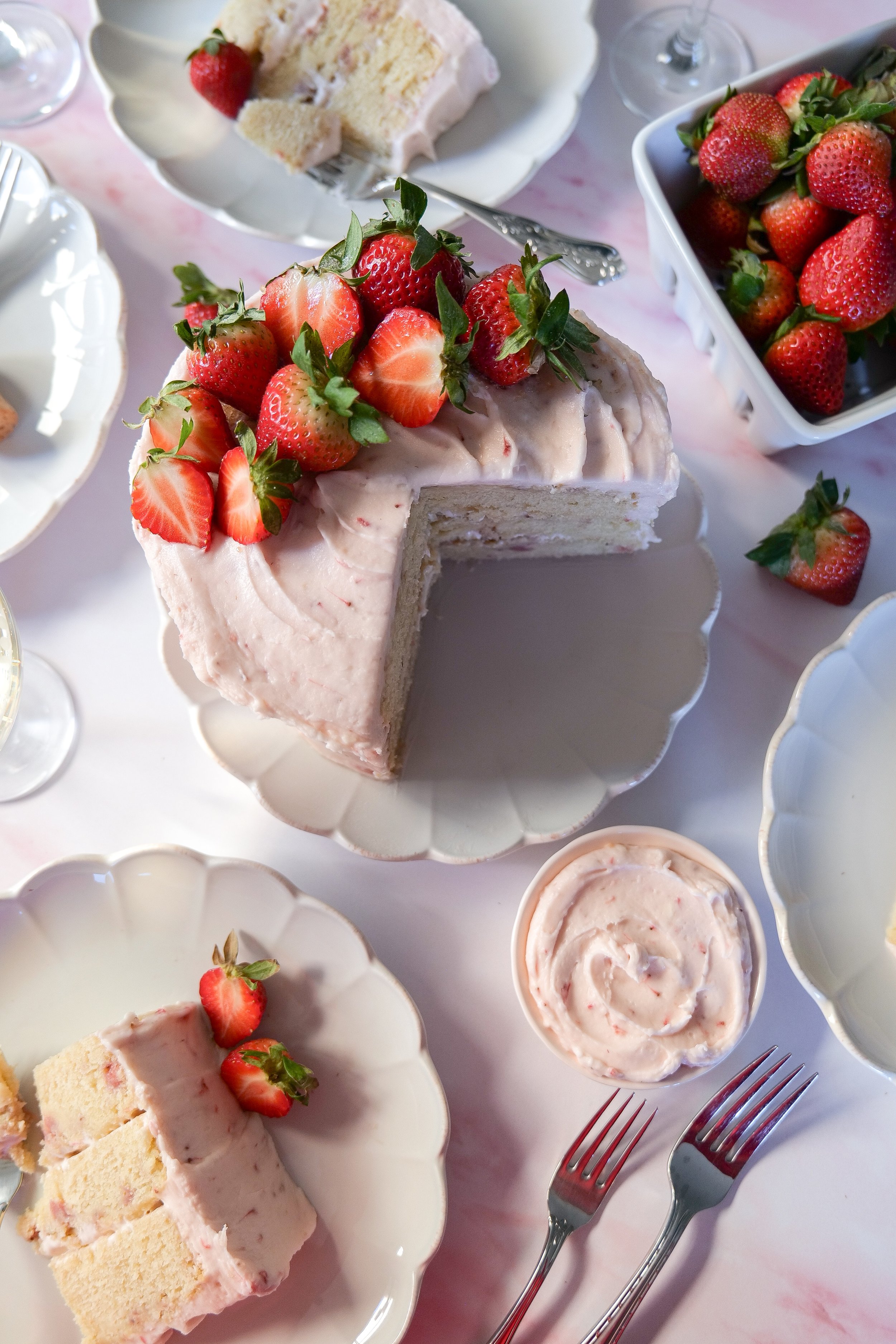 Strawberry Champagne Cake with rich strawberry cream cheese frosting.