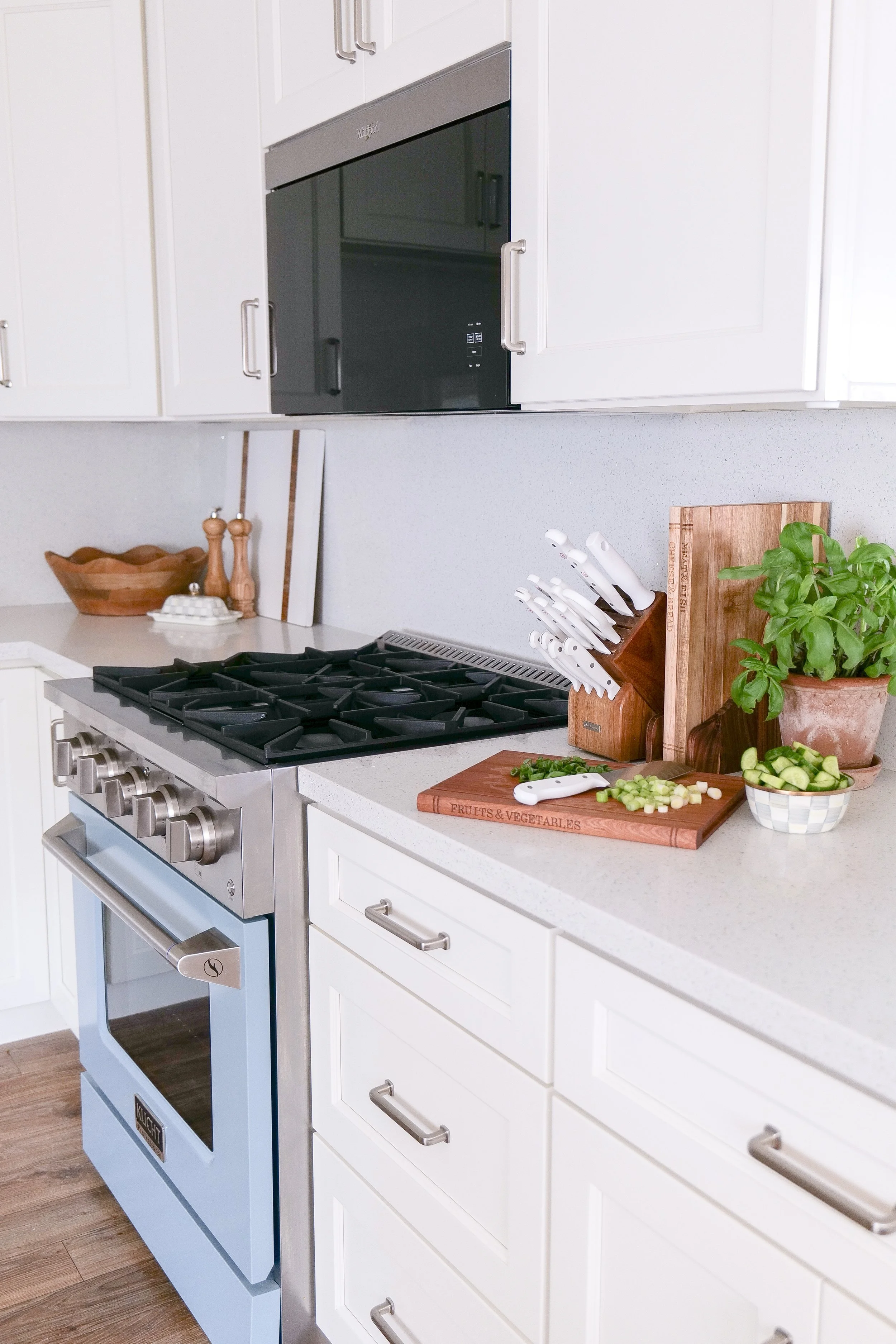 coastal kitchen makeover with brass accents and beach house style decor