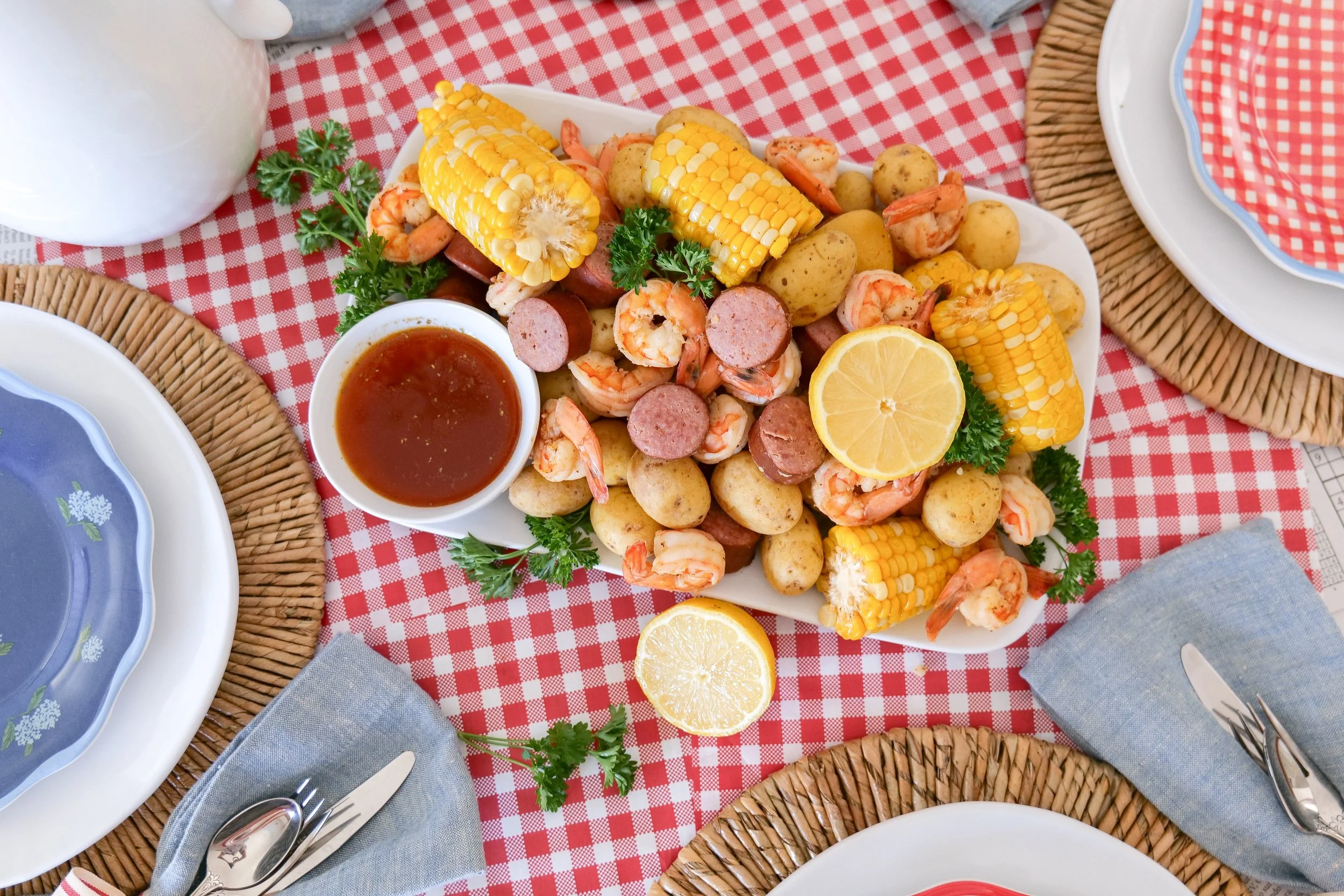 Close-up of an Americana-inspired tablescape with festive summer details.