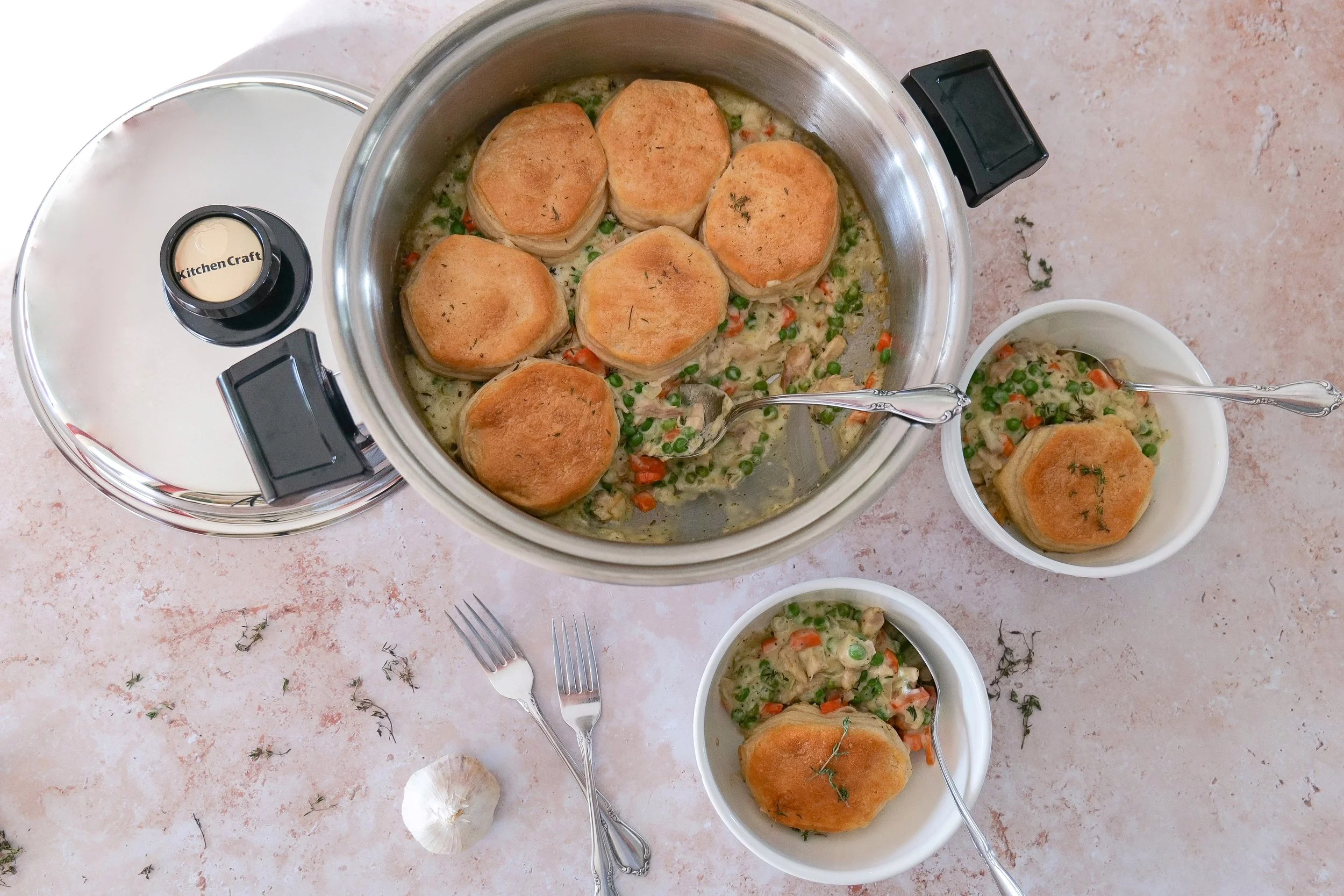 Diced chicken browning in butter as the first step for making an easy skillet chicken pot pie.