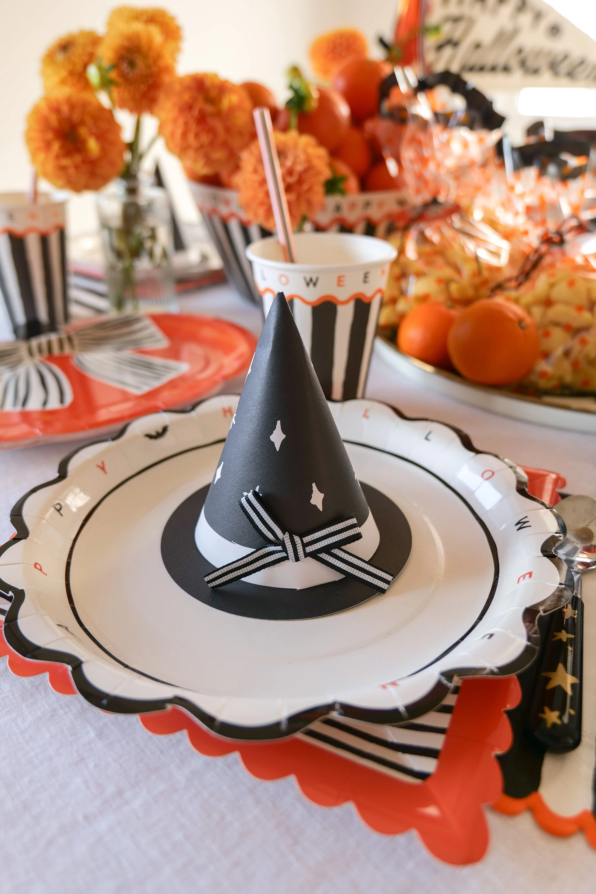 Halloween place setting for kids at a festive breakfast table.