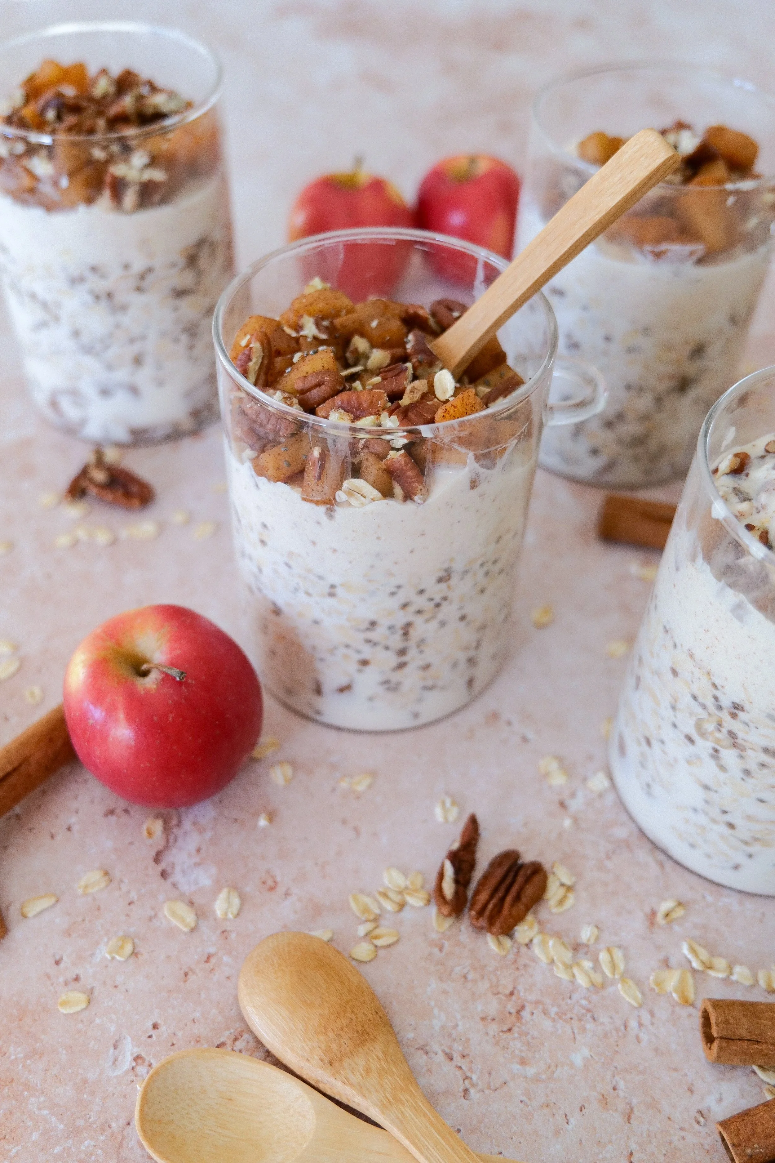 Apple pie overnight oats layered with cinnamon apples, creamy oats and almond butter Greek yogurt.
