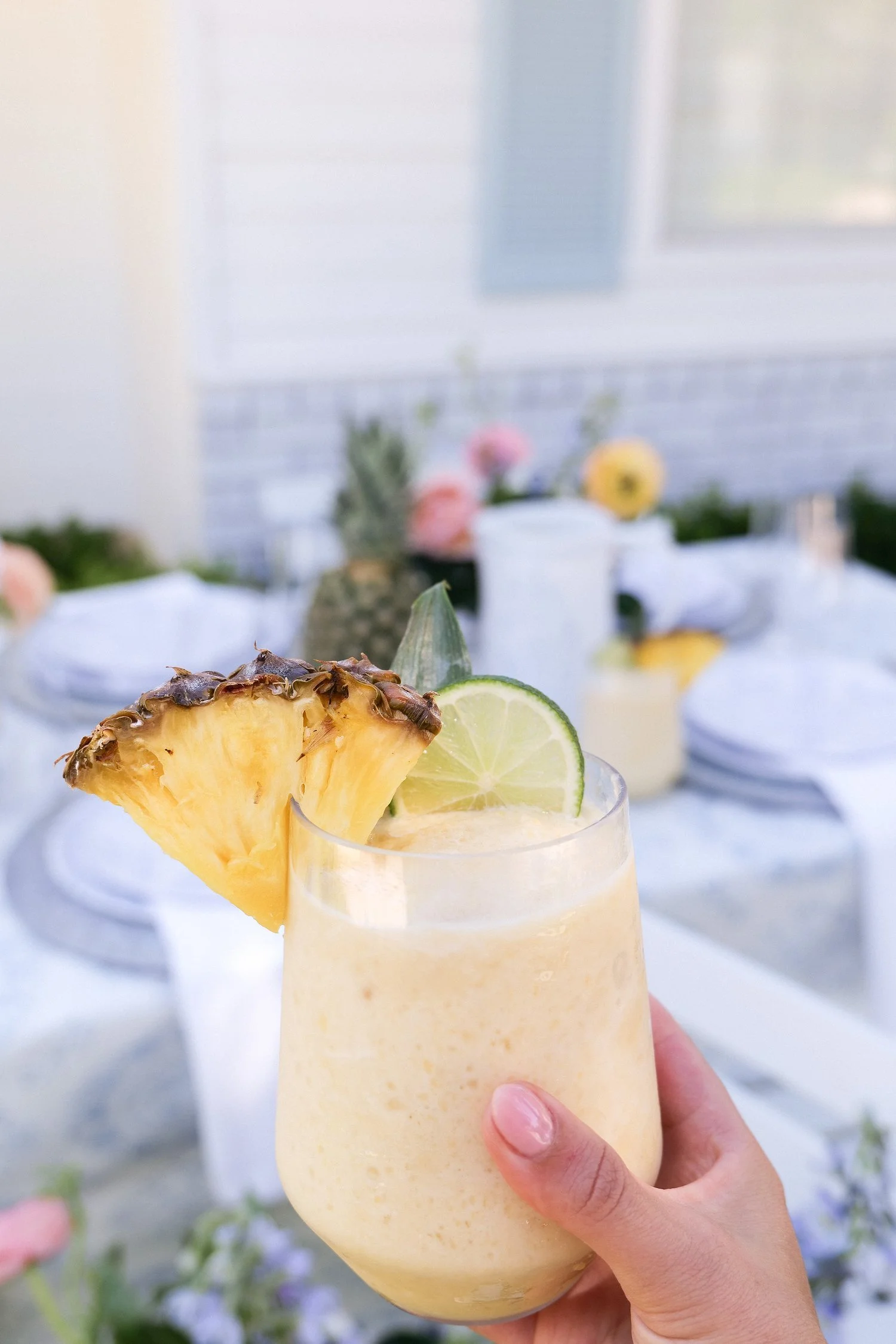 Creamy piña colada pitcher with pineapple and coconut