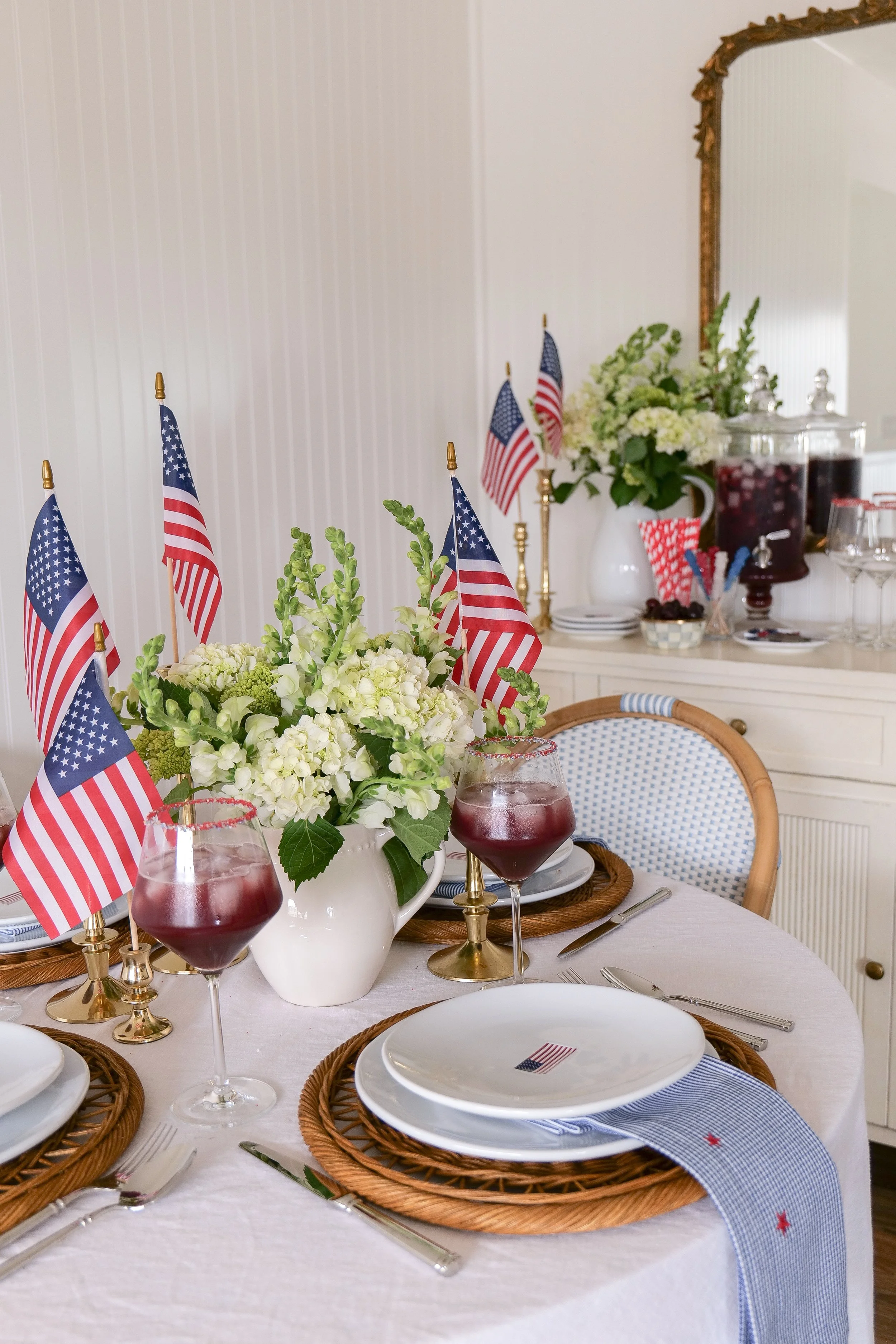 Patriotic dining room table decorated for summer hosting
