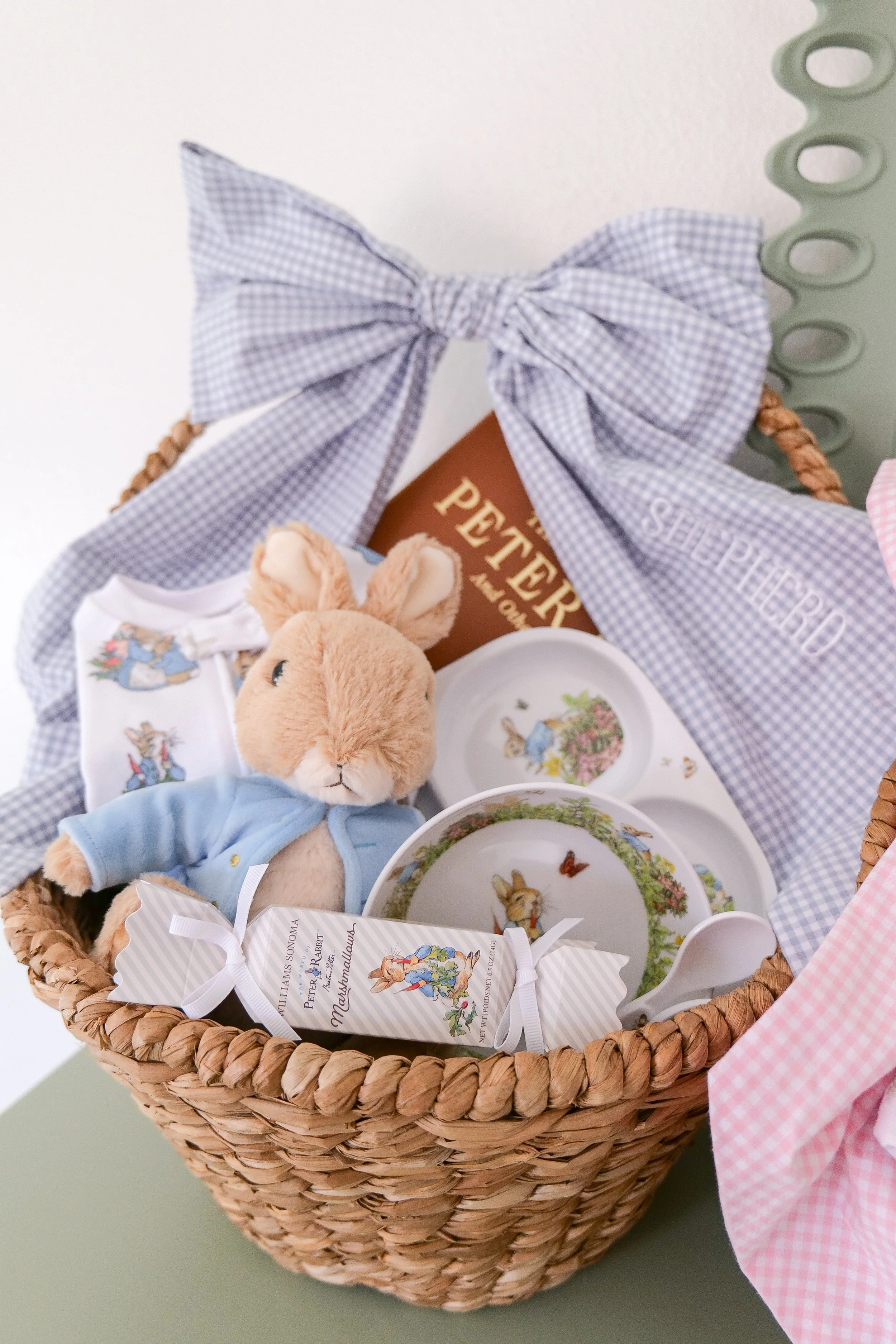 Coordinated themed Easter basket for kids with gifts and activities arranged around a playful theme.