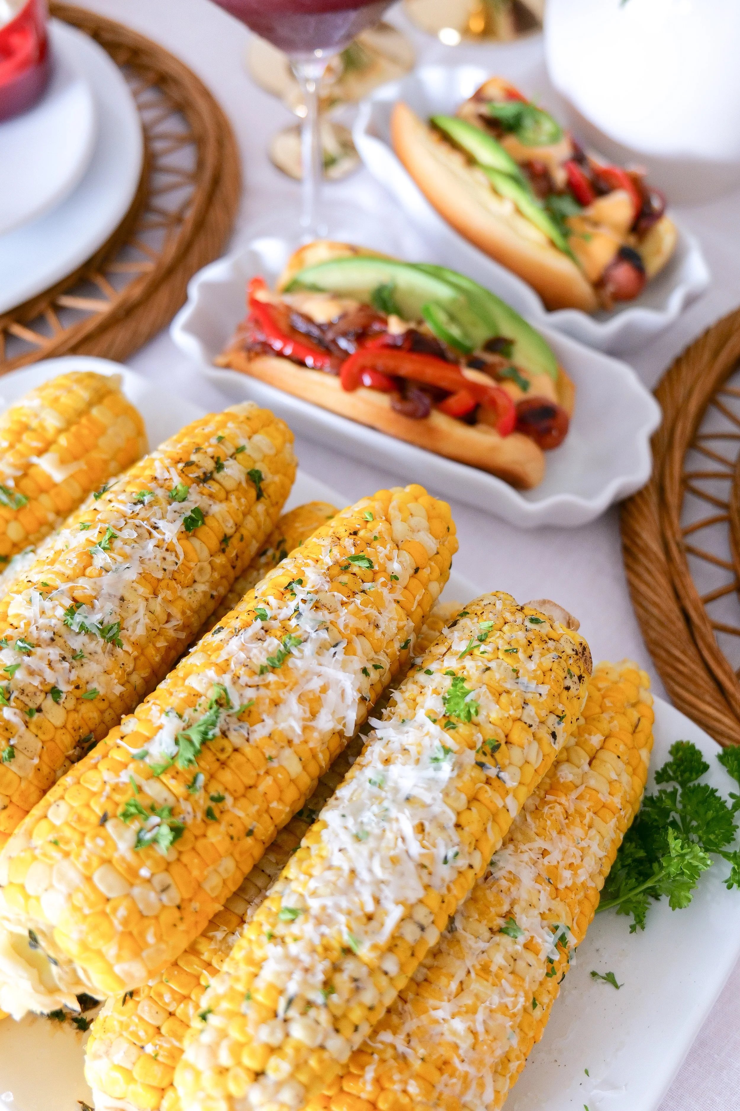 Red white and blue tablescape styled with corn on the cob