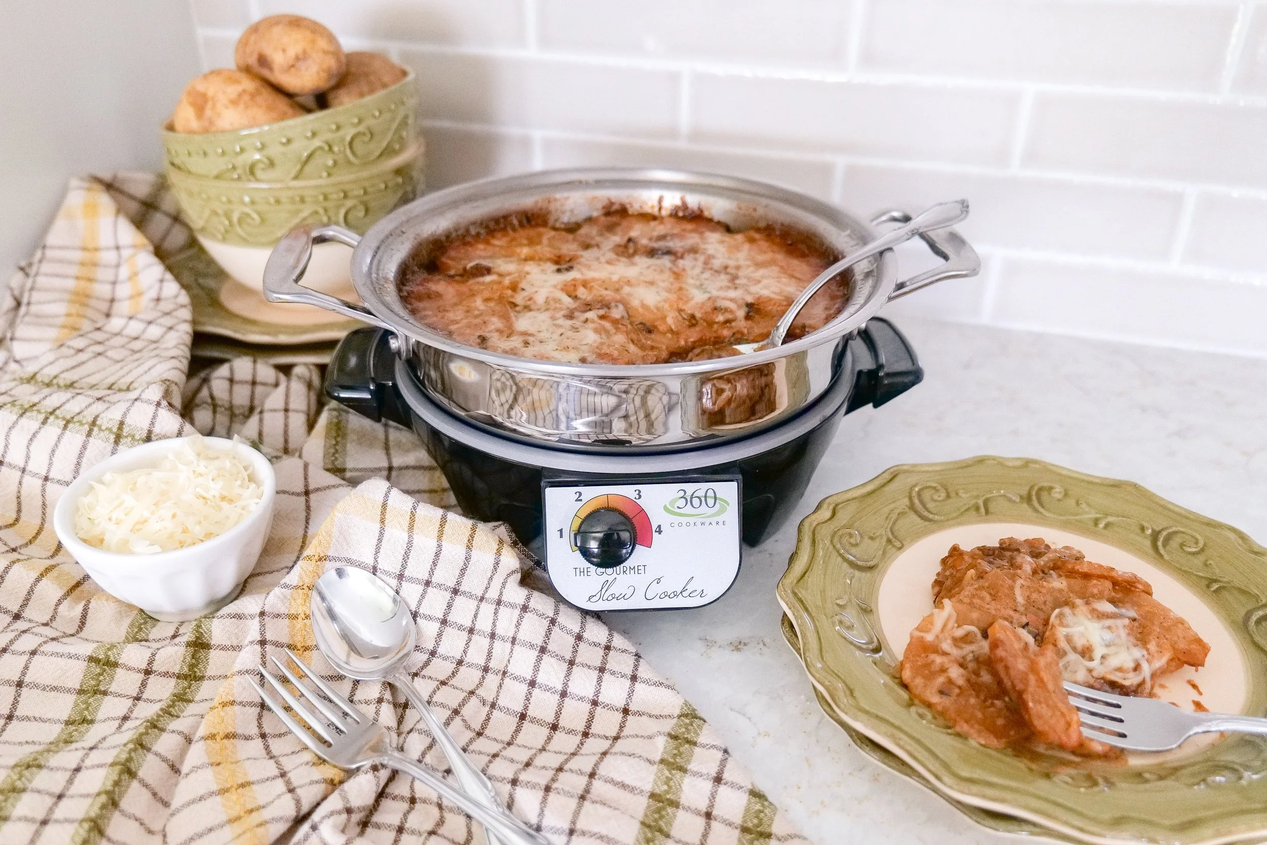 Rustic homemade scalloped potatoes in a slow cooker.