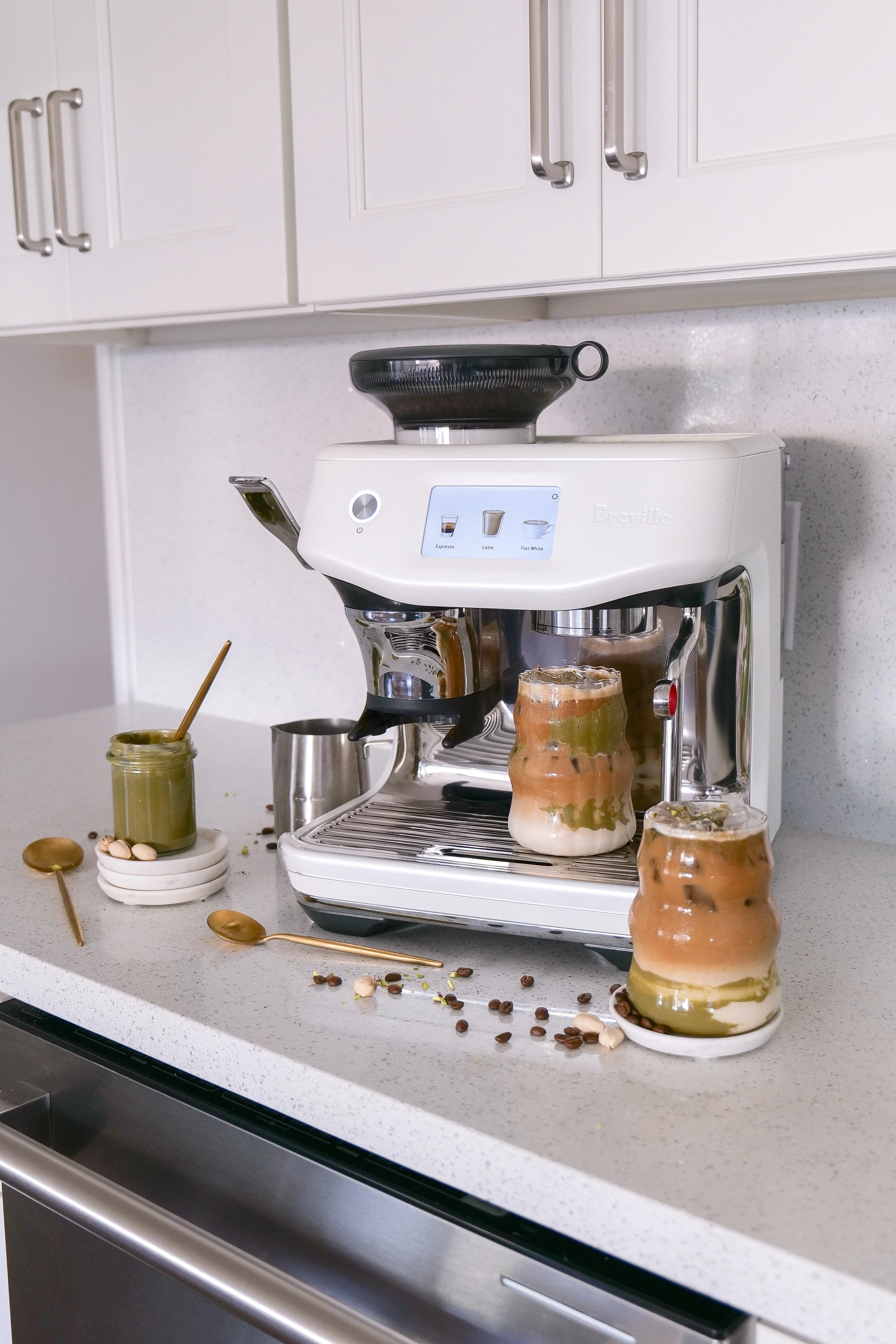 Easy iced pistachio latte recipe made with espresso, pistachio cream, syrup, and milk.
