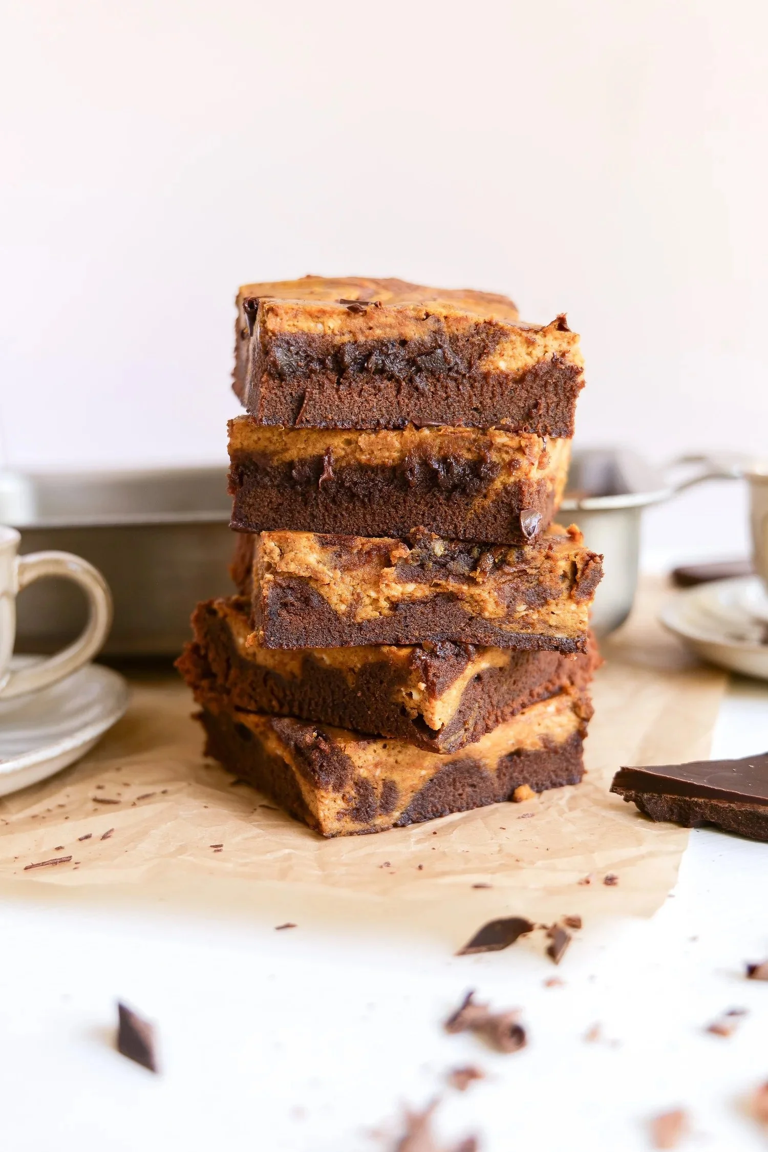 Pumpkin swirl brownies with rich chocolate brownie batter and a spiced pumpkin swirl for fall.