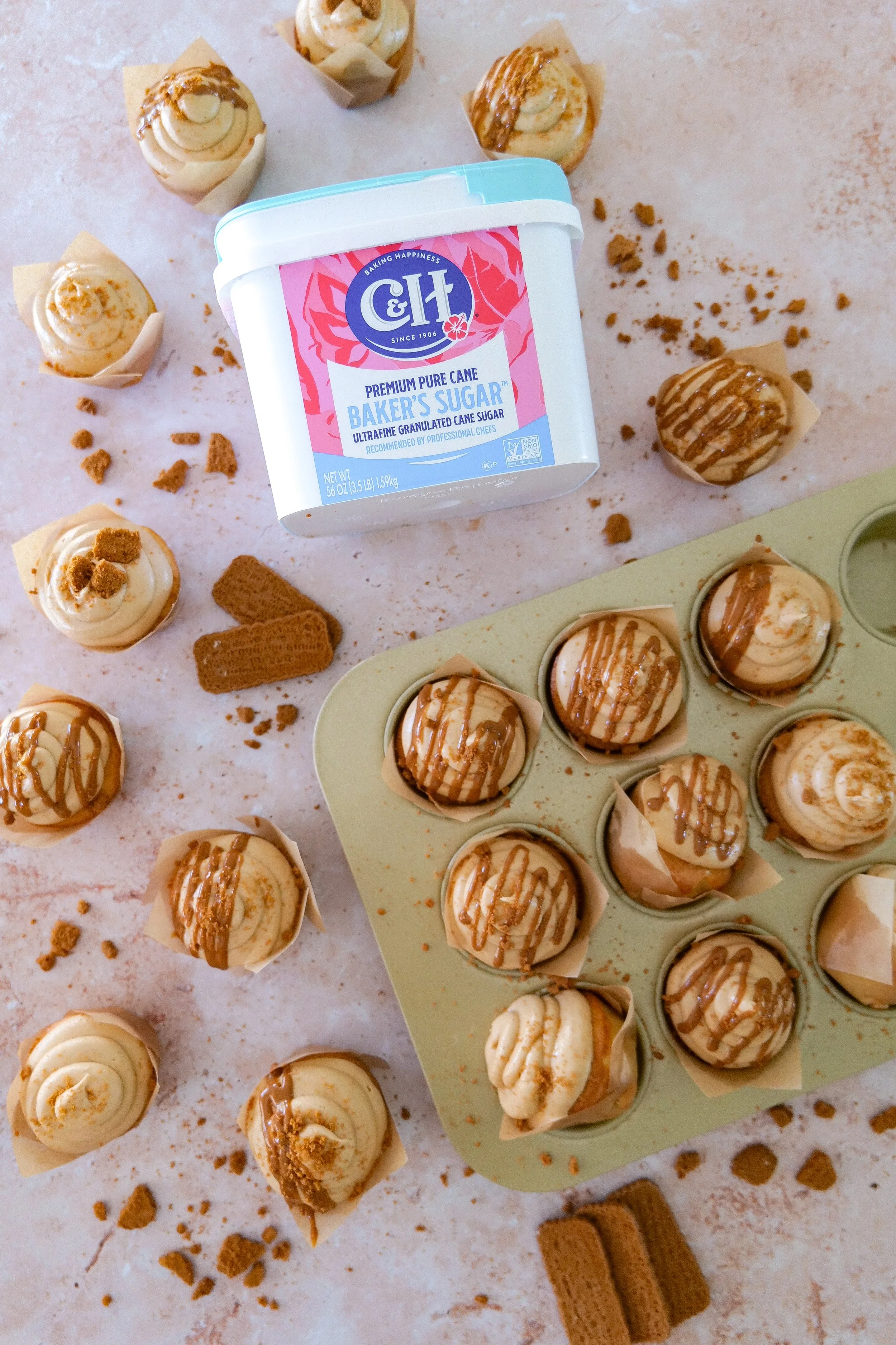 Homemade cookie butter cupcakes topped with swirled cookie butter frosting