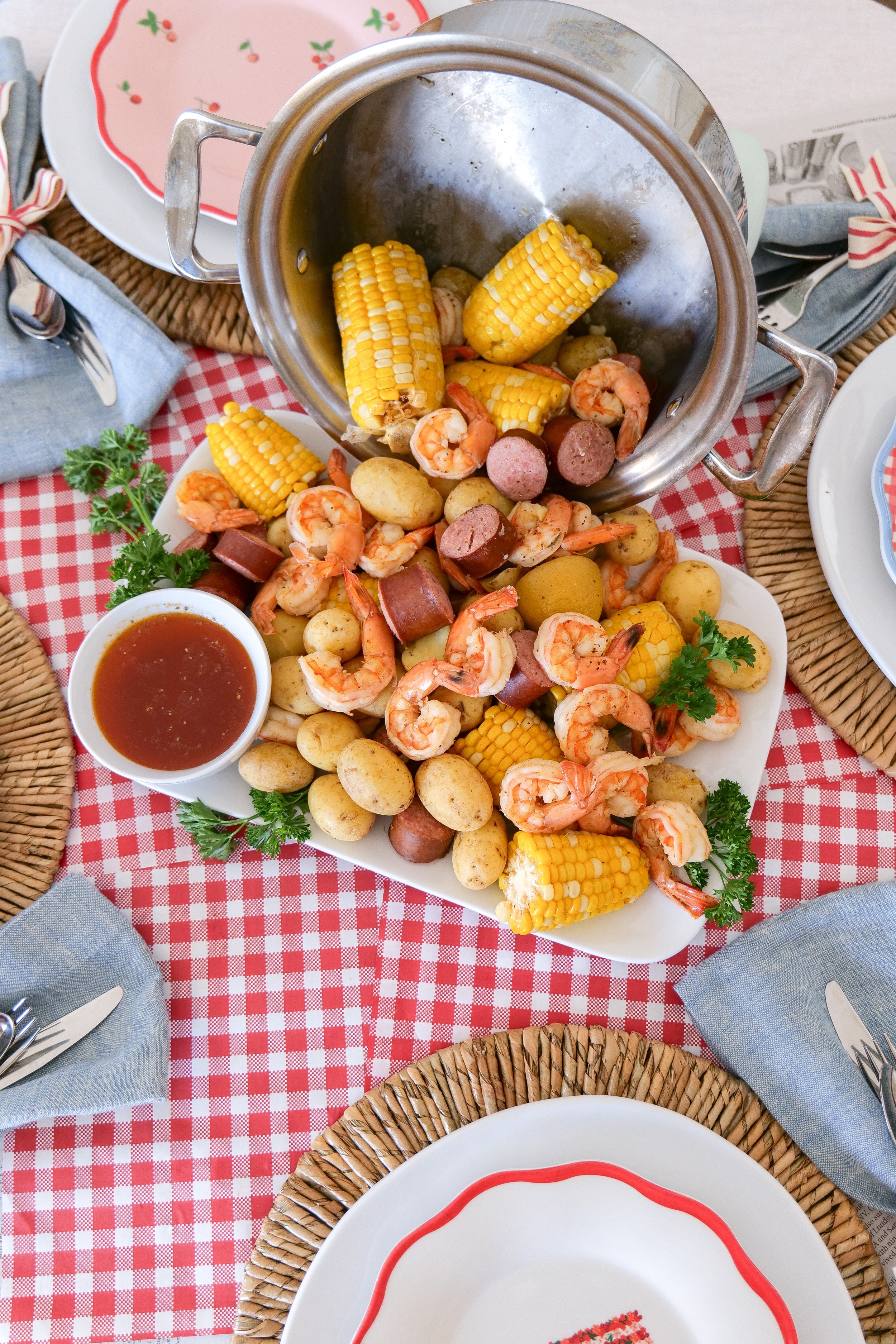 Festive shrimp boil dinner served for a patriotic summer gathering.