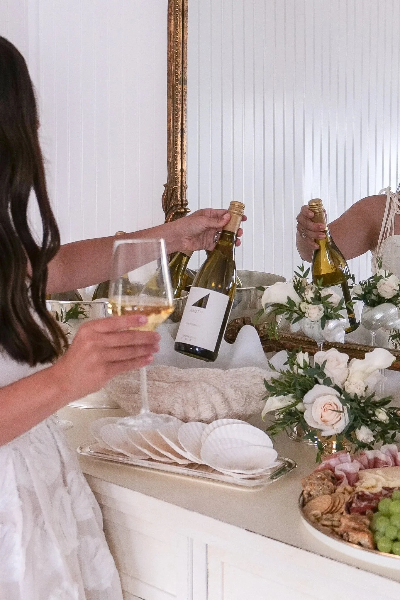Coastal-inspired summer tablescape with wine and entertaining essentials