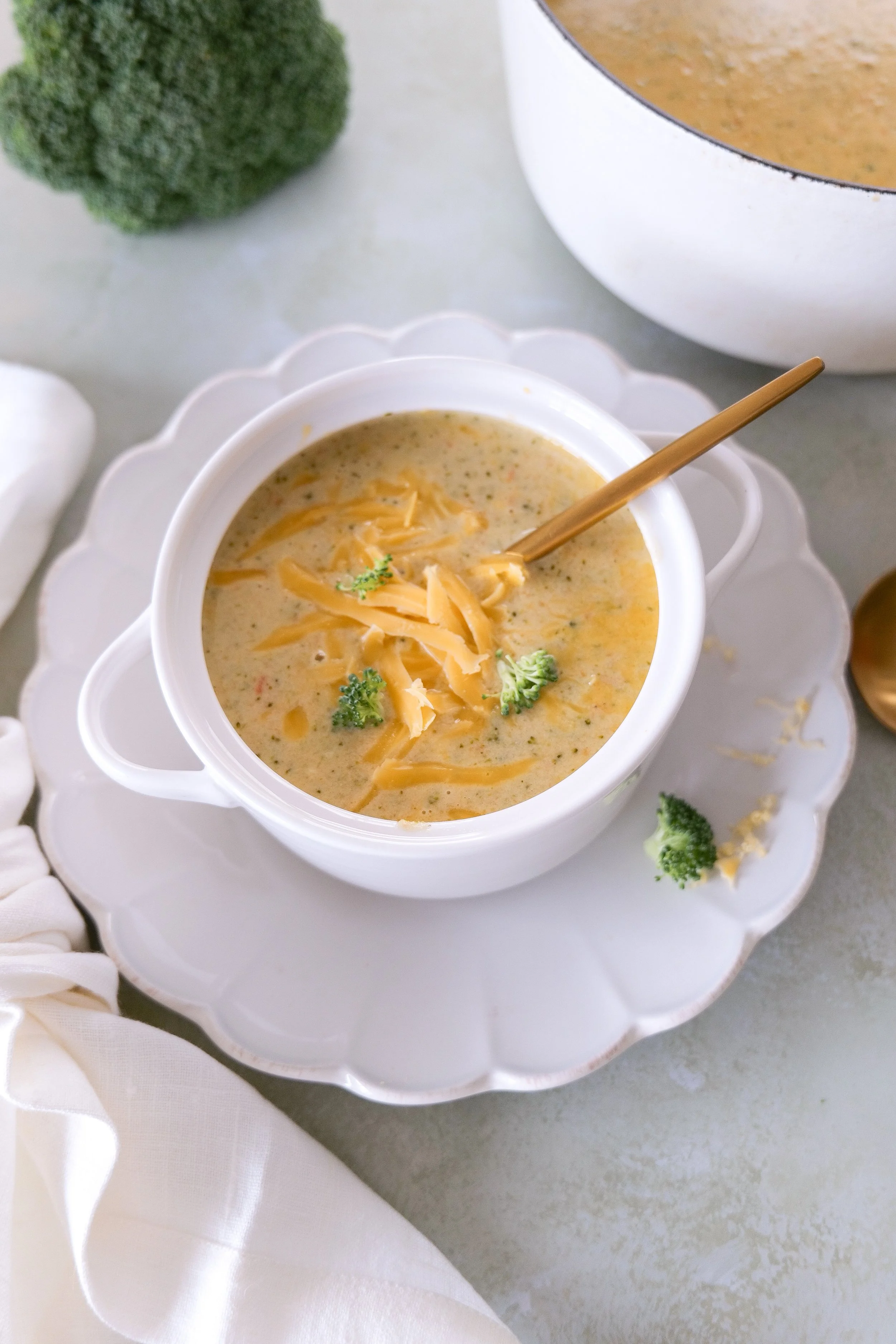 Warm bowl of homemade broccoli cheddar soup ready to serve for dinner.