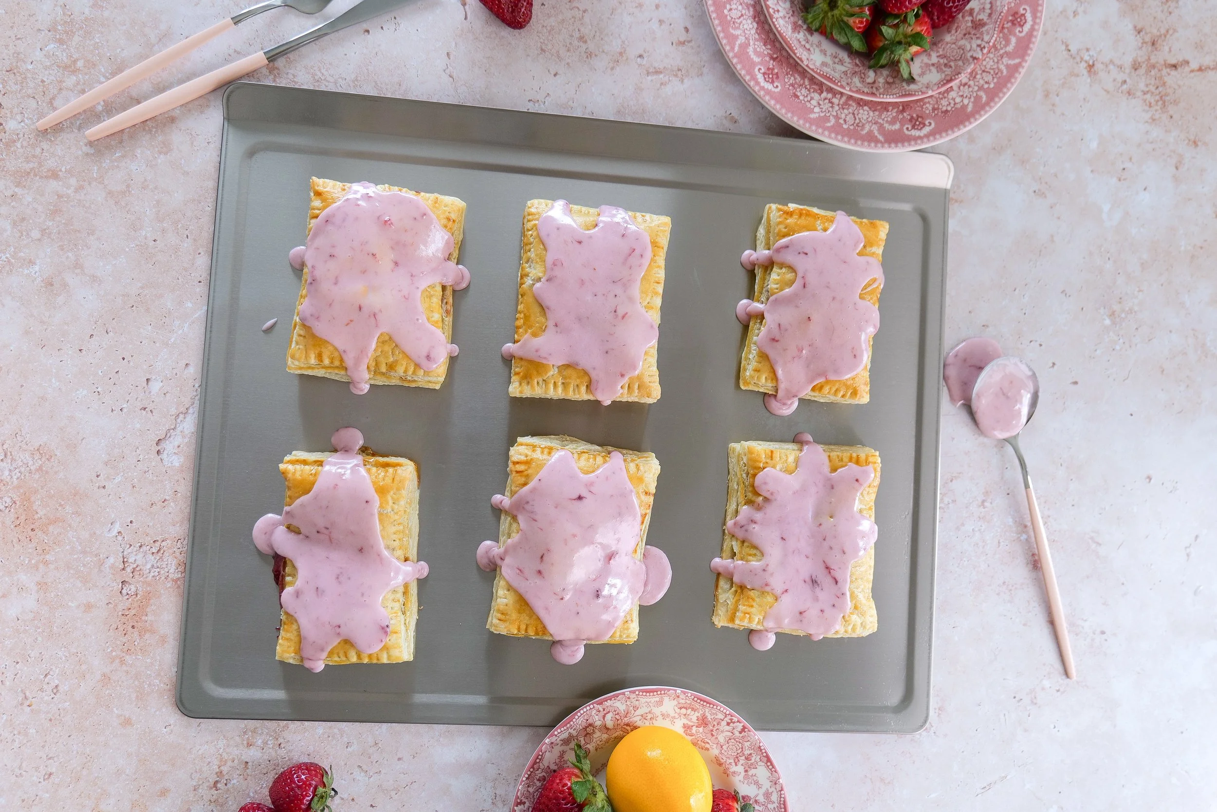 Close-up of Strawberry Puff Pastry Pop Tart with sweet strawberry glaze