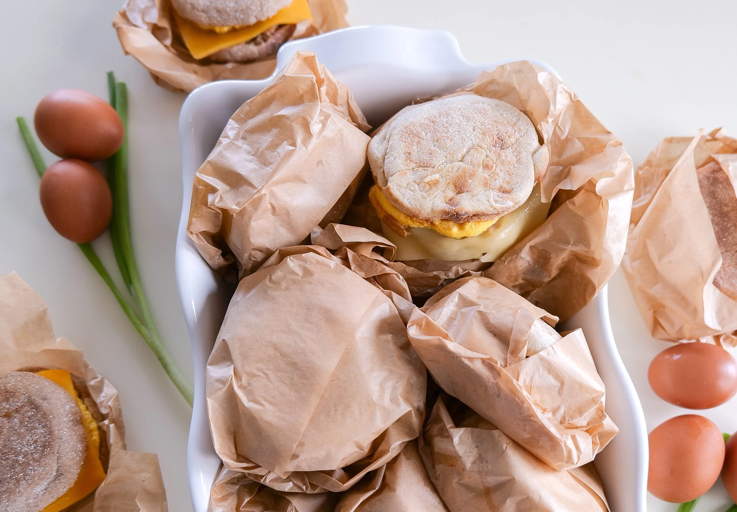 Homemade sausage English muffin sandwich for an easy meal prep breakfast.