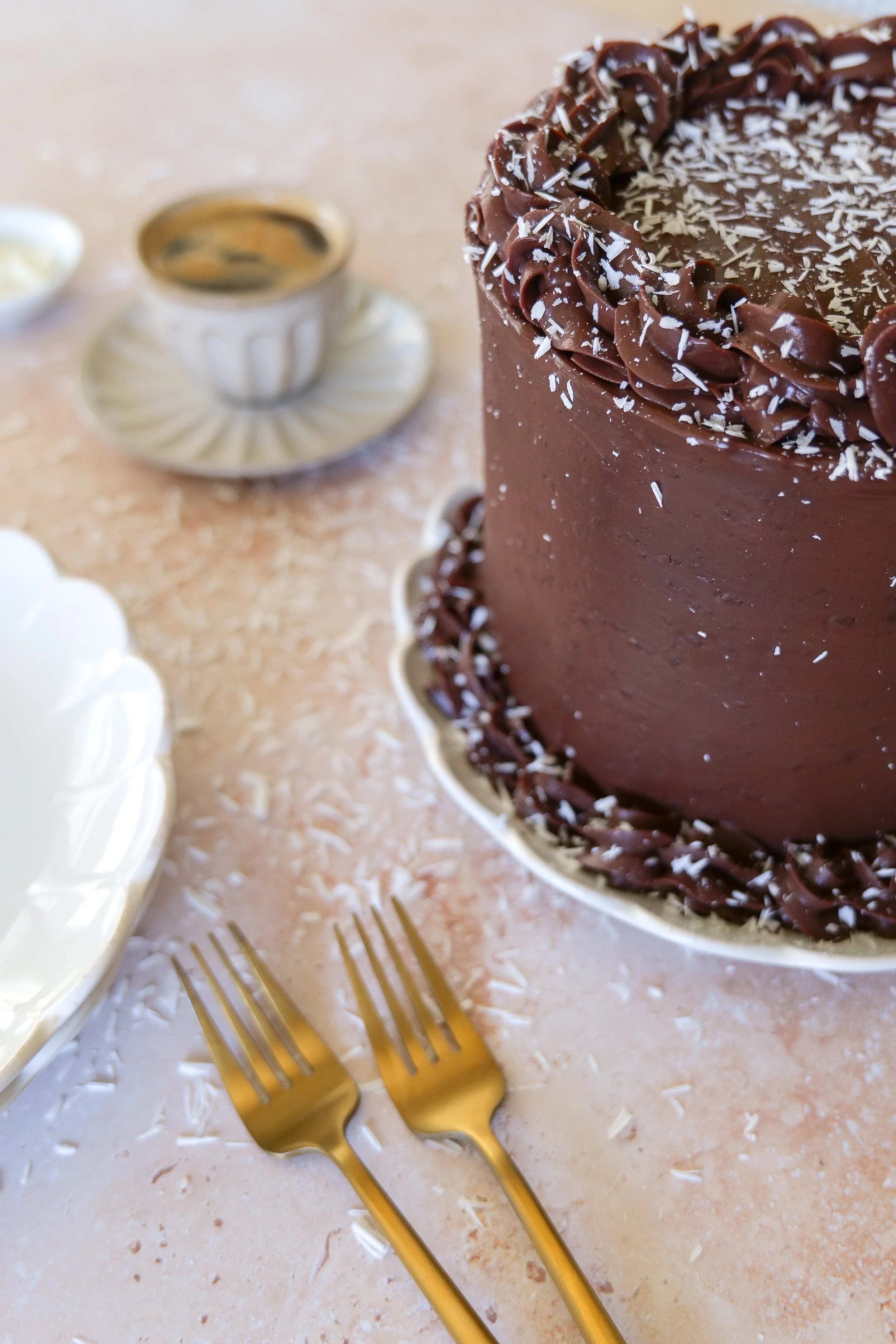 Tuxedo Cake layered with chocolate mousse and white chocolate mousse and covered in chocolate ganache.