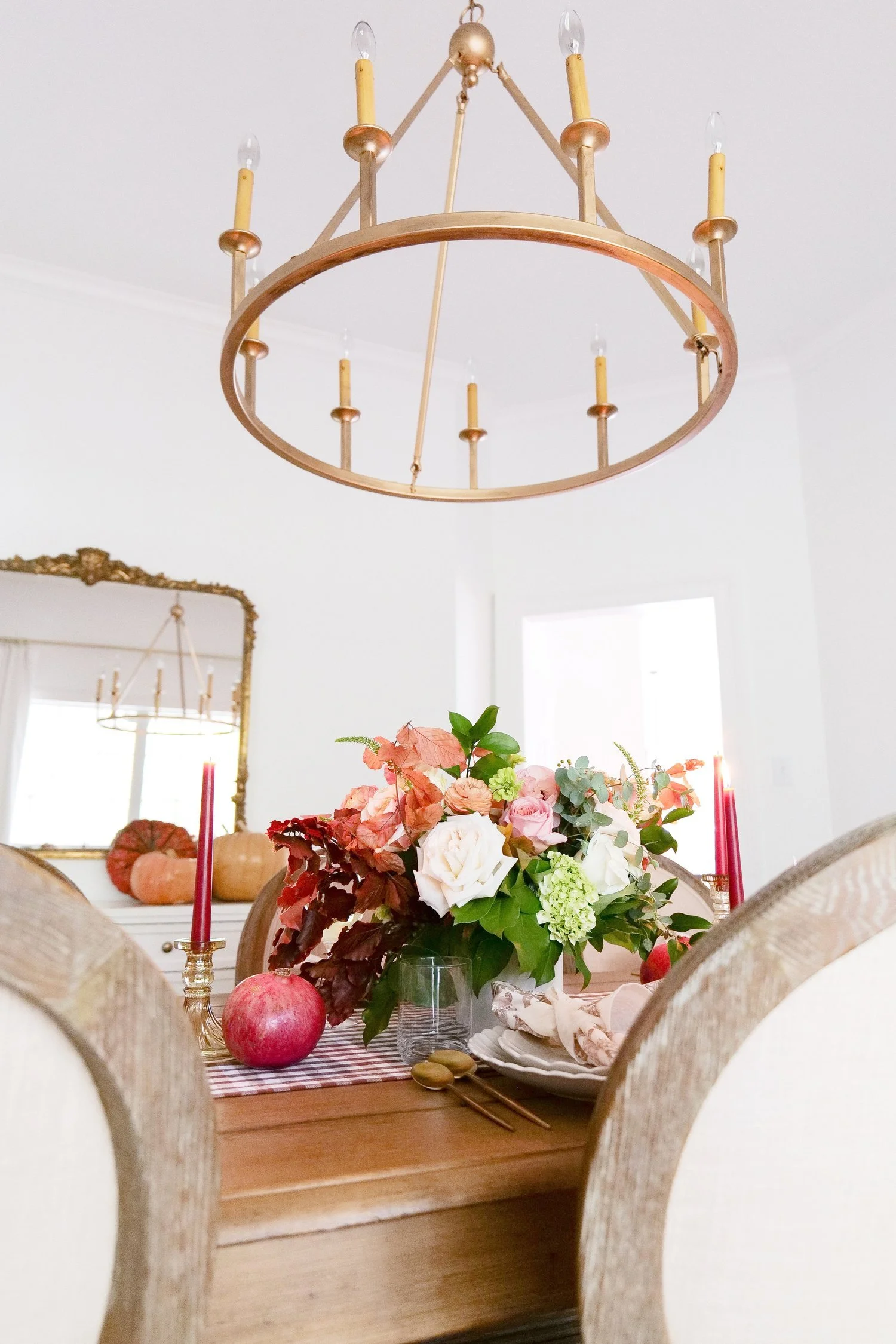 Thanksgiving tablescape decorated with pears and pomegranates