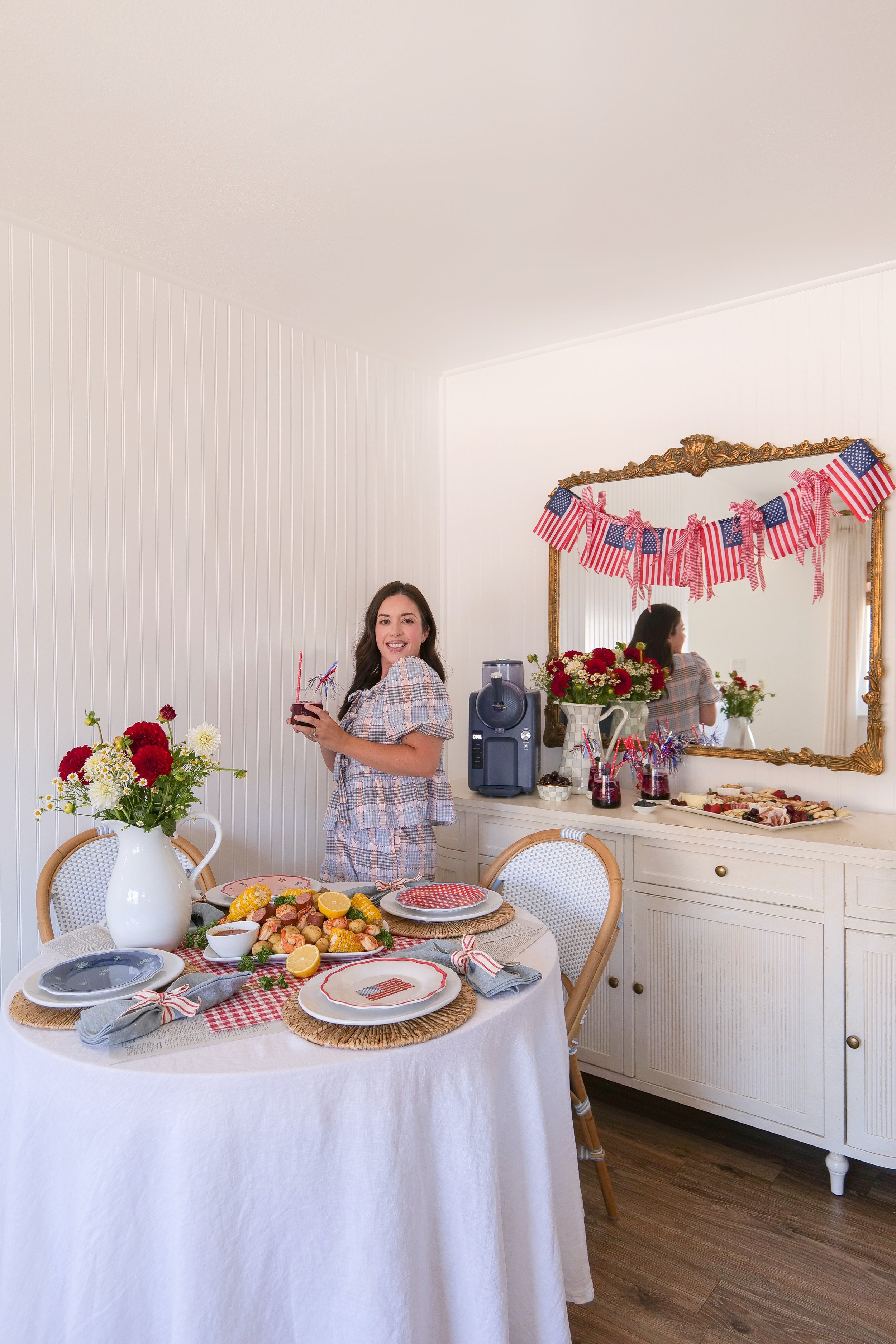 Americana dinner party table styled with red, white, and blue accents.