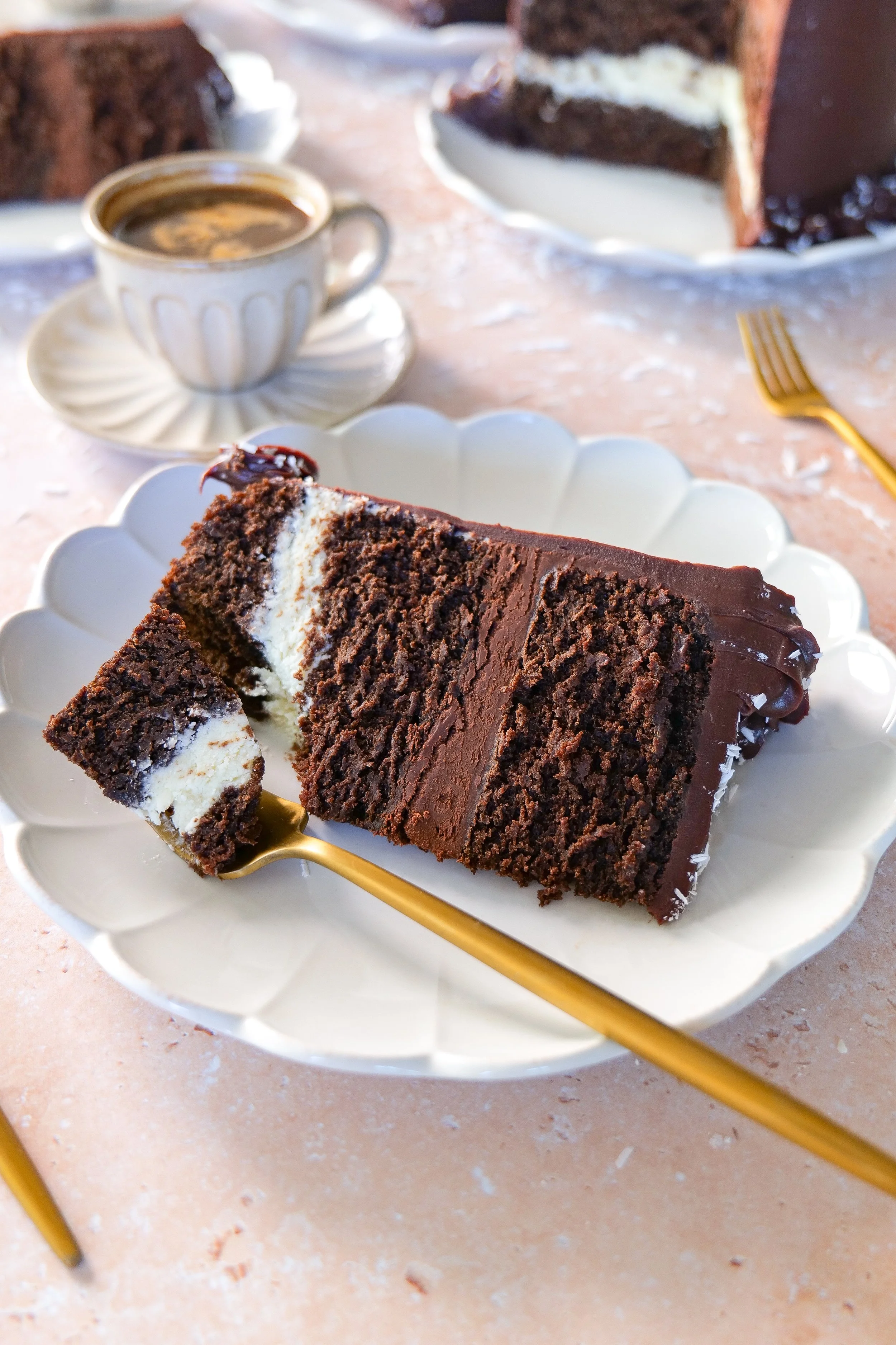 Homemade brown butter chocolate cake made with espresso and layered into a decadent Tuxedo Cake.