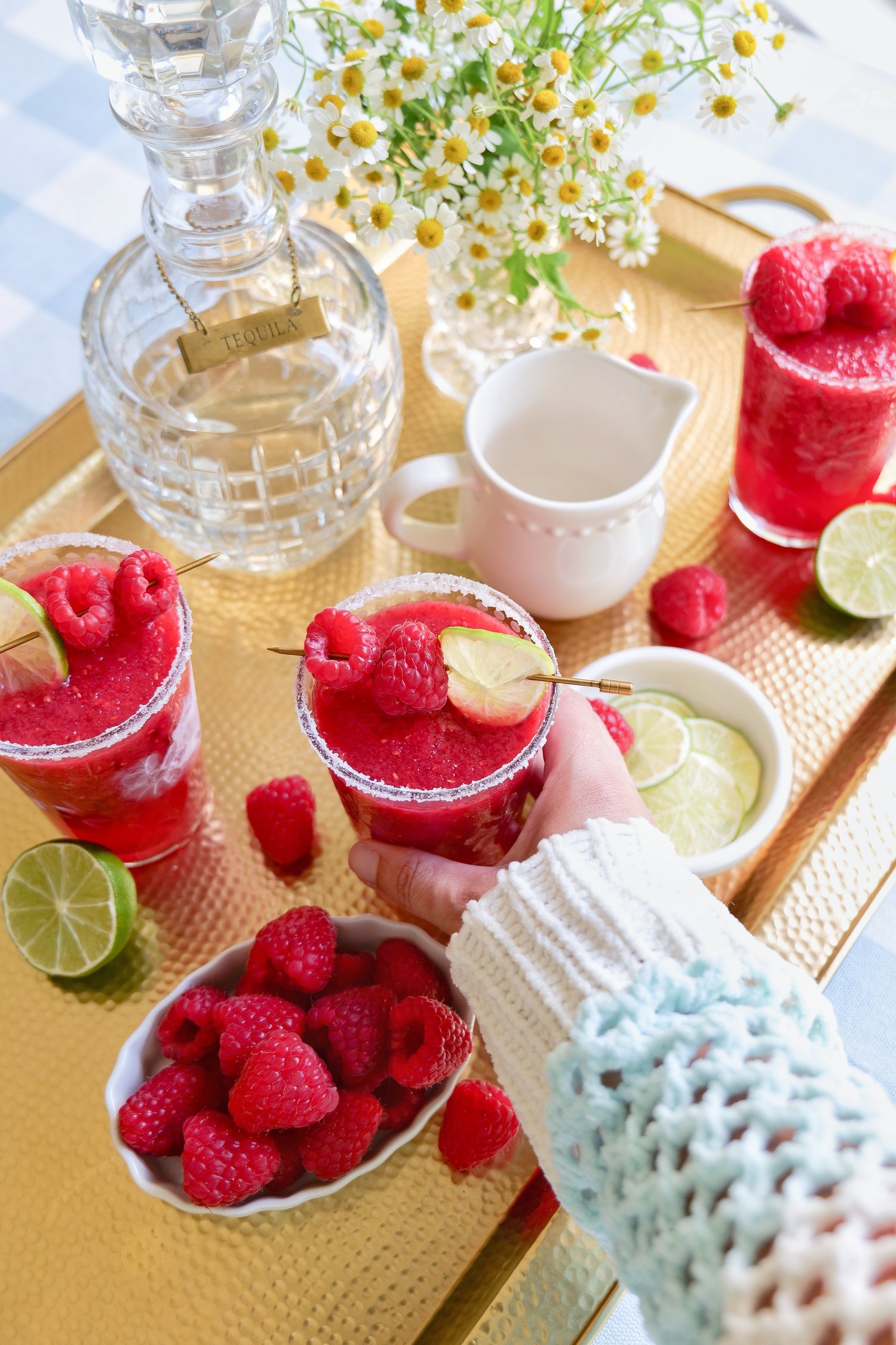 Raspberry margarita with salt and sugar rim