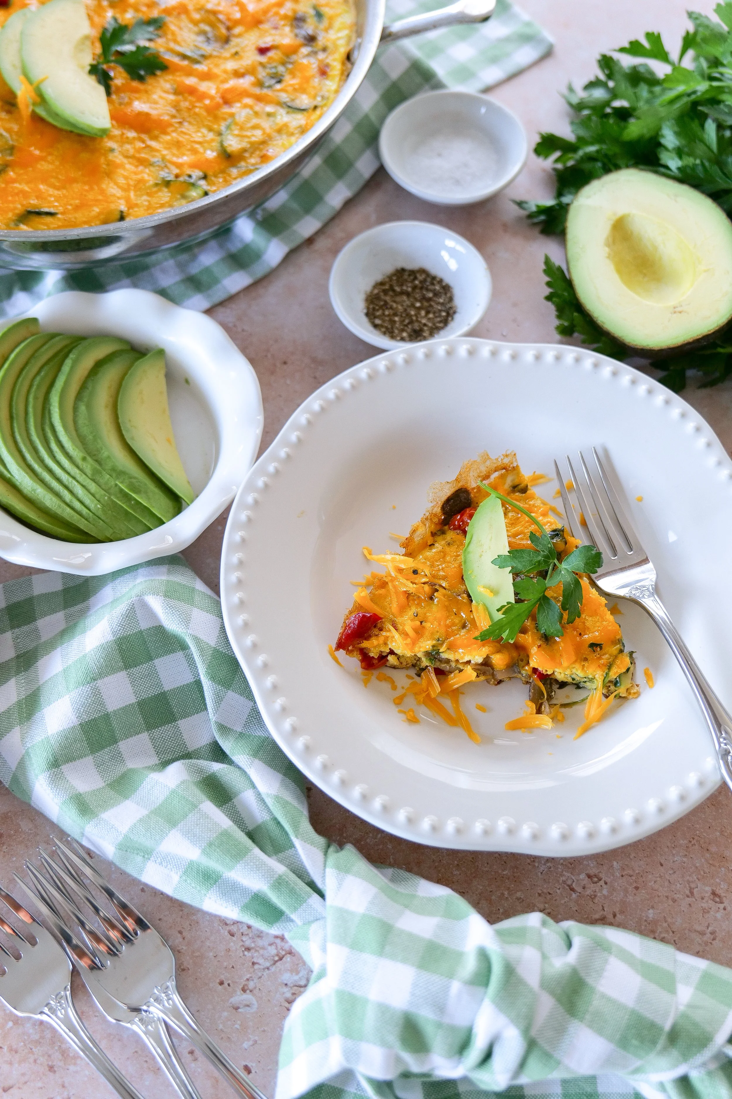 Spinach and tomato frittata with fluffy eggs and fresh basil