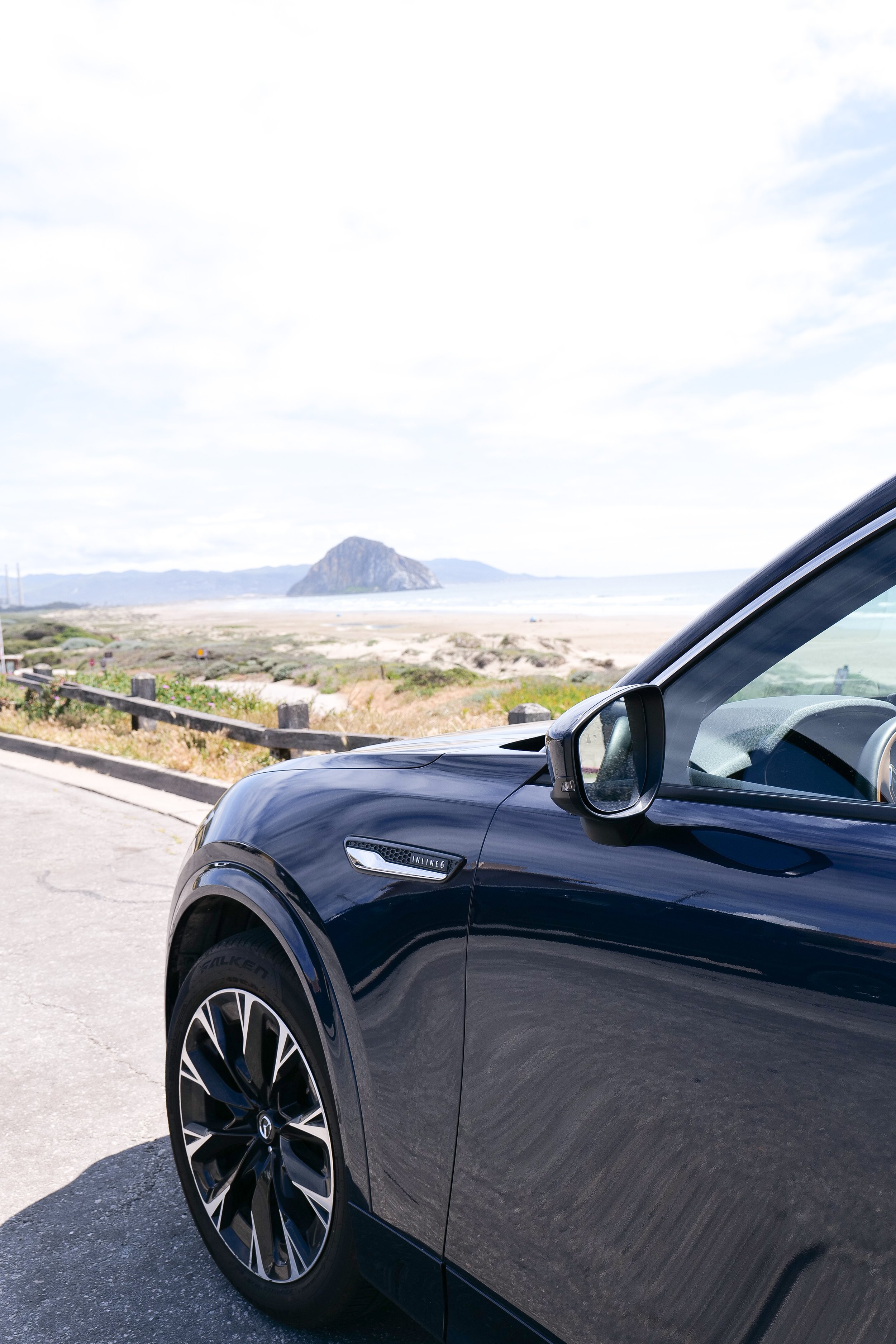Family-friendly Mazda SUV with advanced safety technology and cargo space.