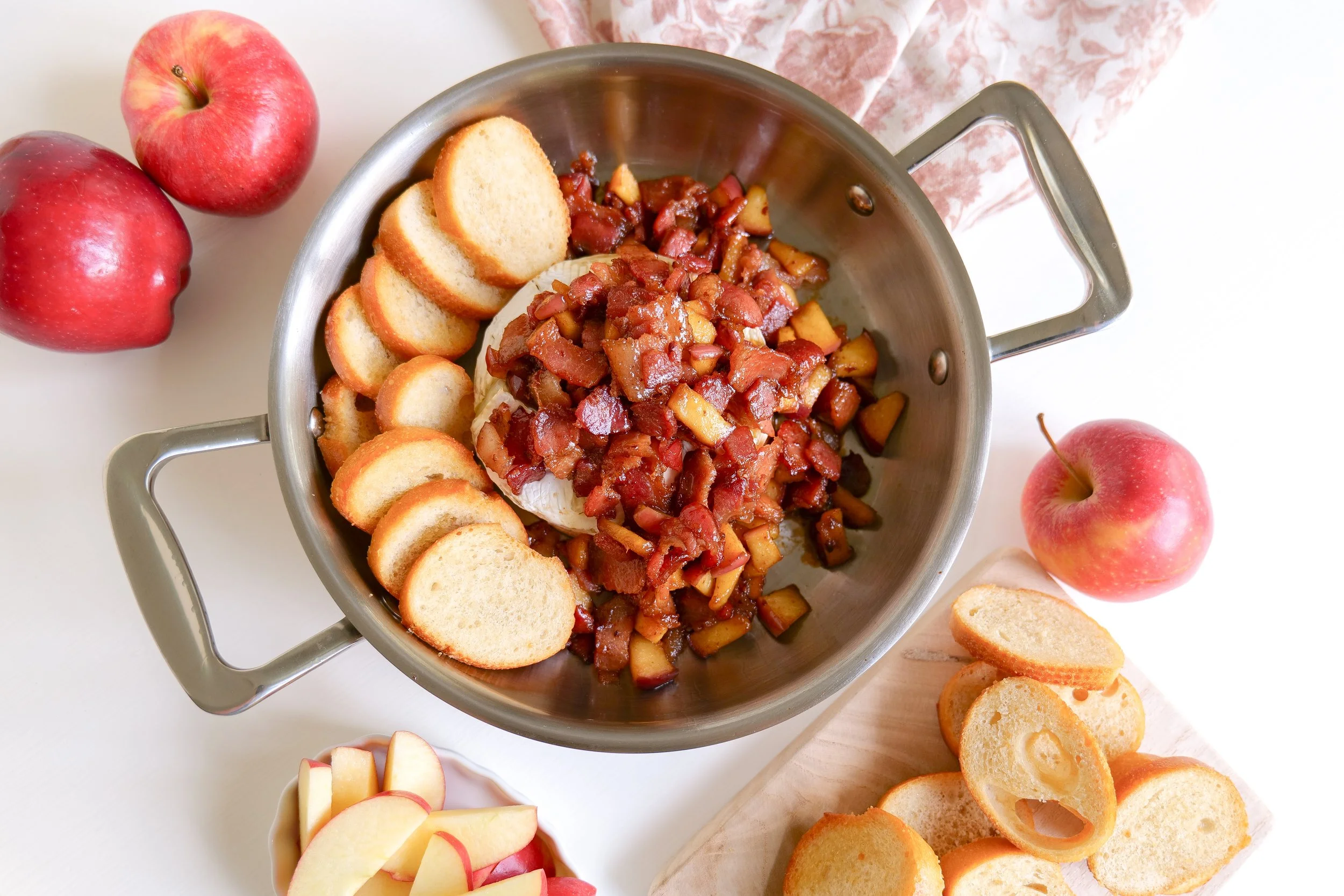 Easy baked brie recipe served with crackers for a simple holiday appetizer.