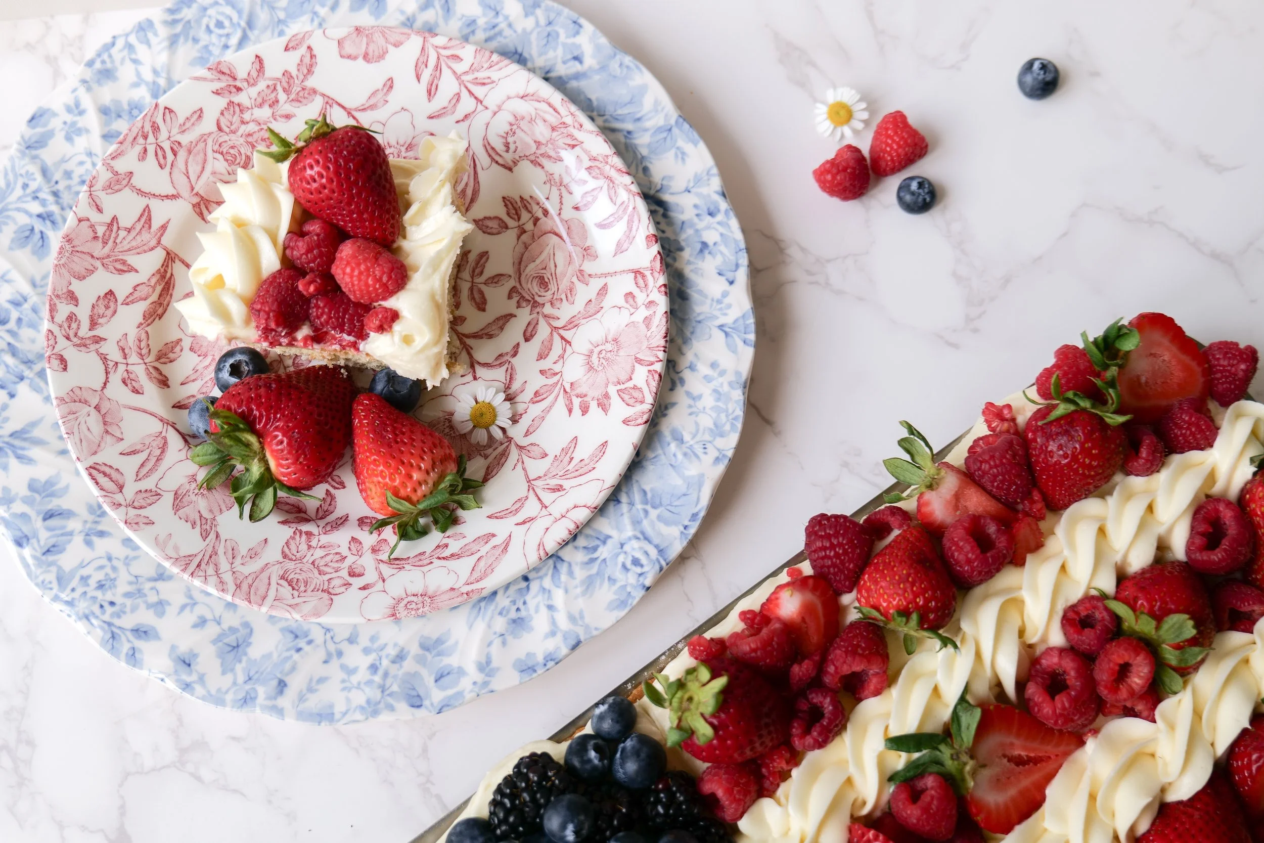 July Fourth party dessert featuring a fruit pizza with patriotic colors