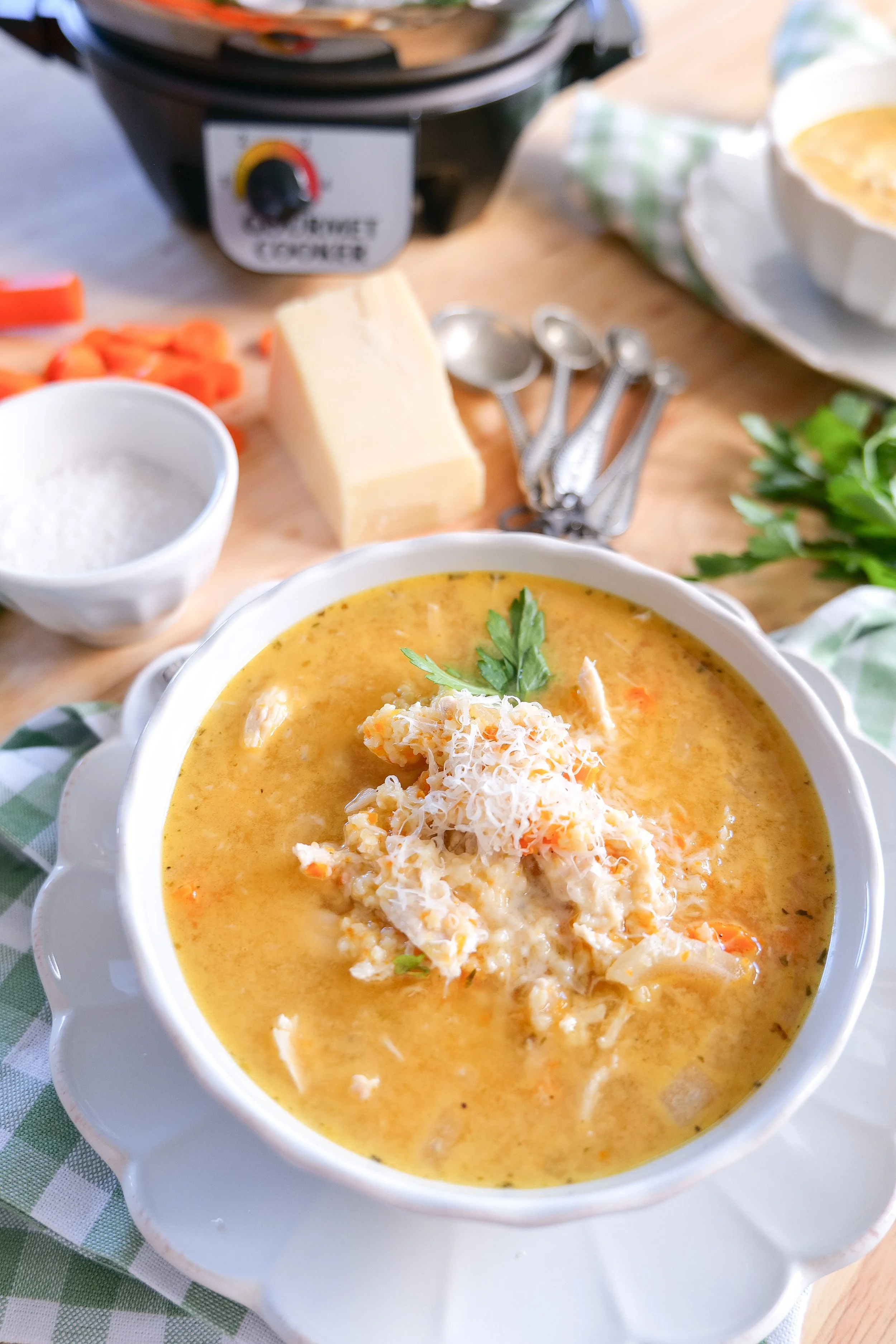 Cozy Italian chicken pastina soup finished with freshly grated Parmesan and parsley.